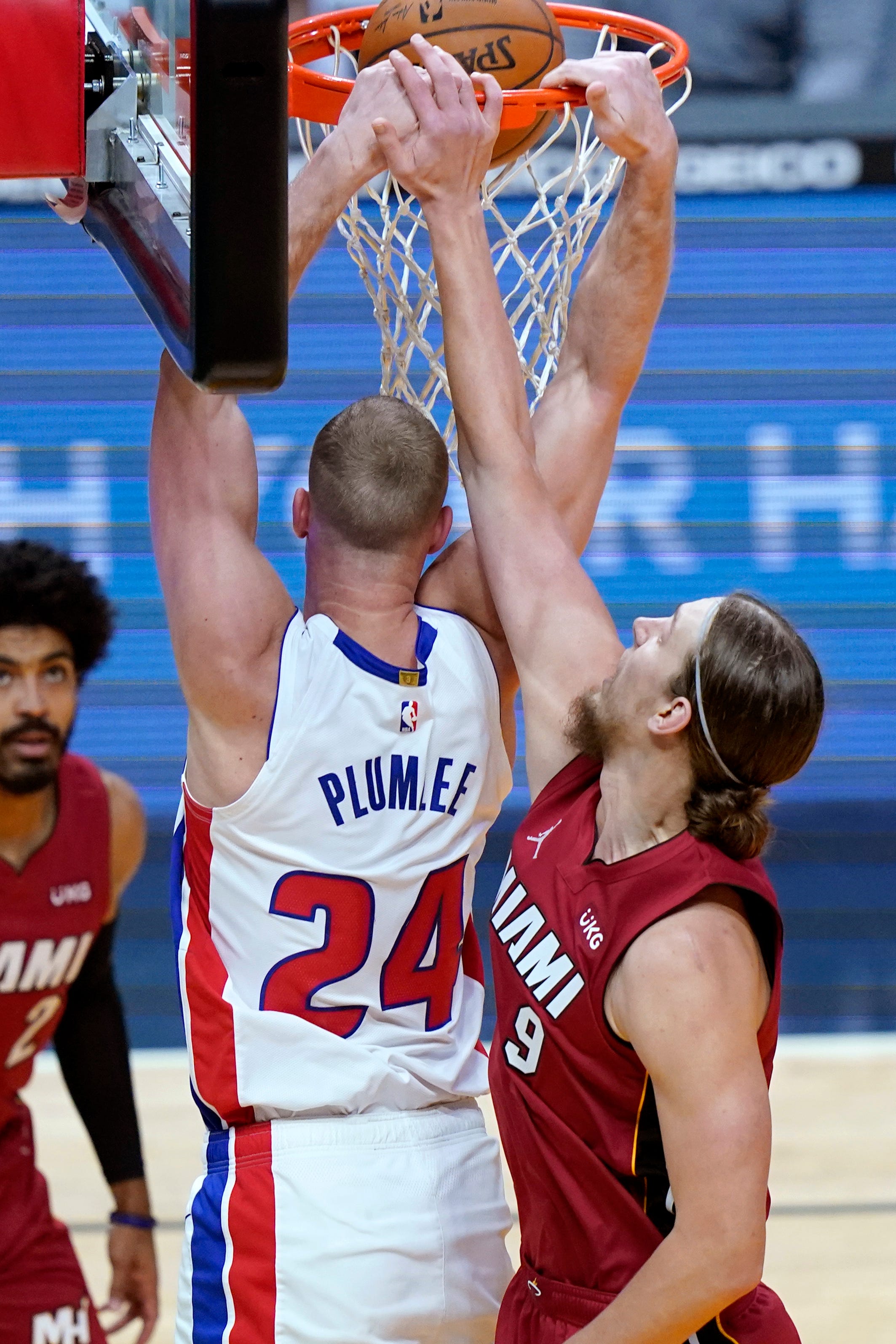 Detroit Pistons center Mason Plumlee (24) shoots over Miami Heat forward Kelly Olynyk (9) during the first half.