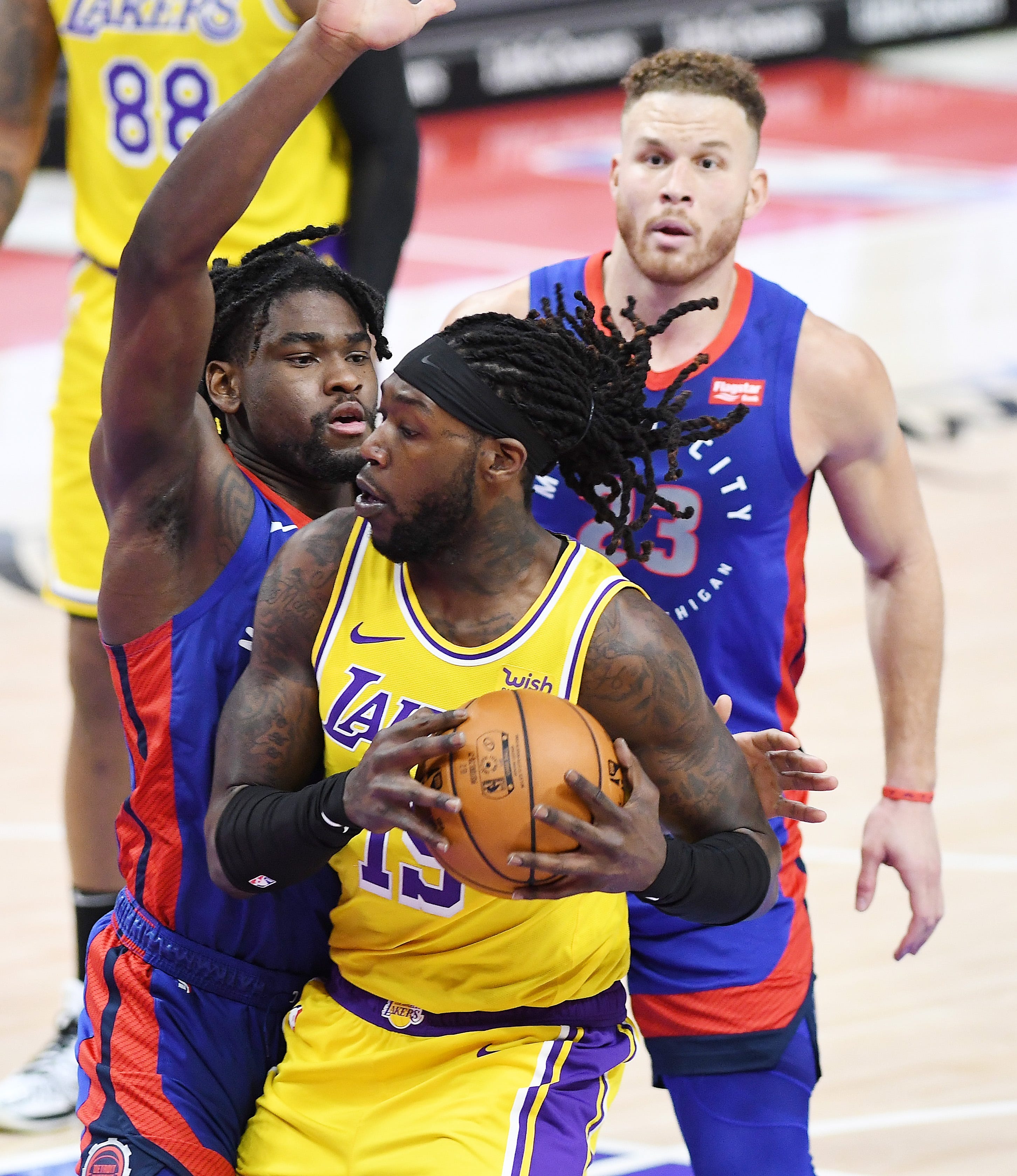 Pistons' Isaiah Stewart defends Lakers' Montrezl Harrell in the third quarter.