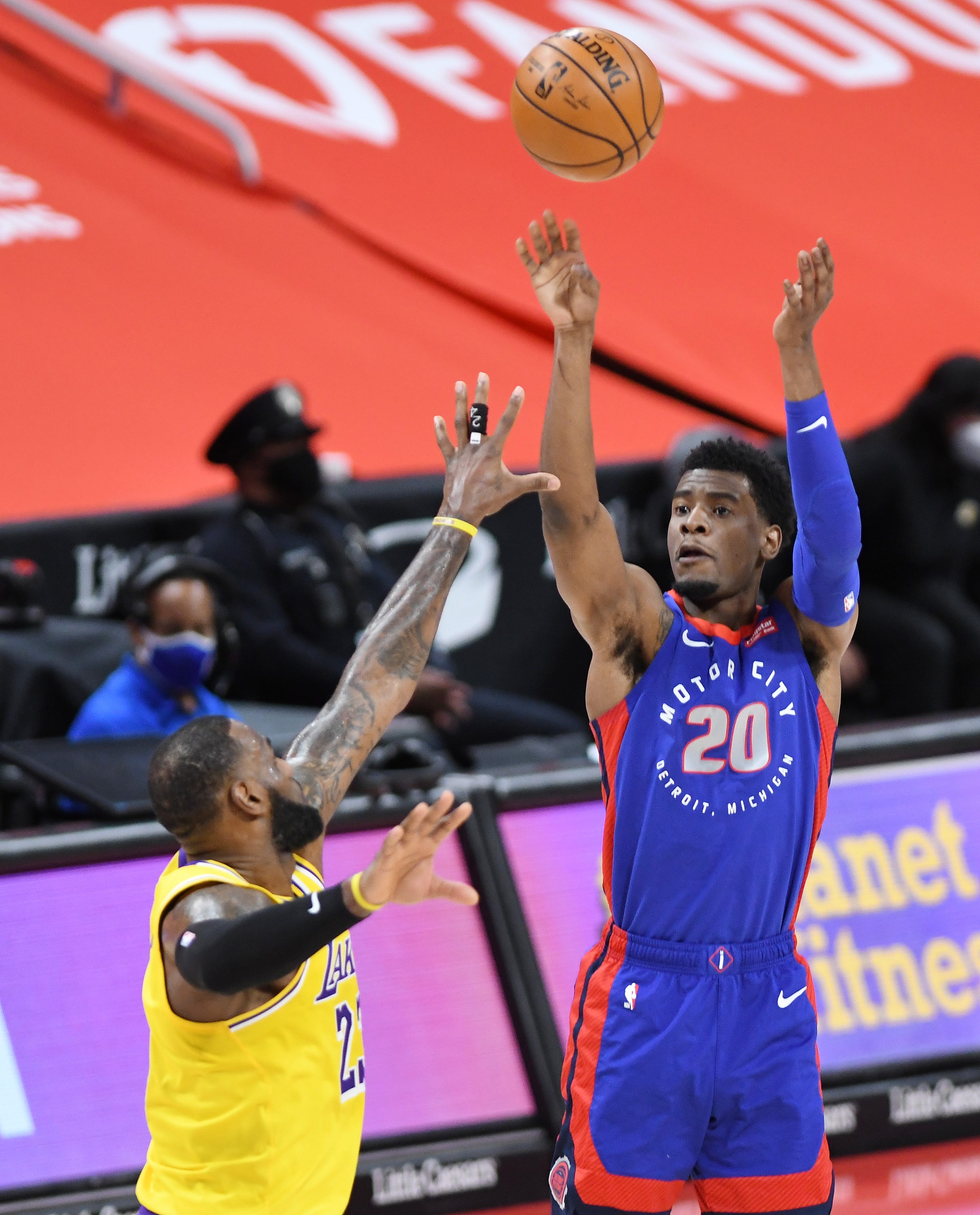 Pistons' Josh Jackson shoots over Lakers' LeBron James in the second quarter.