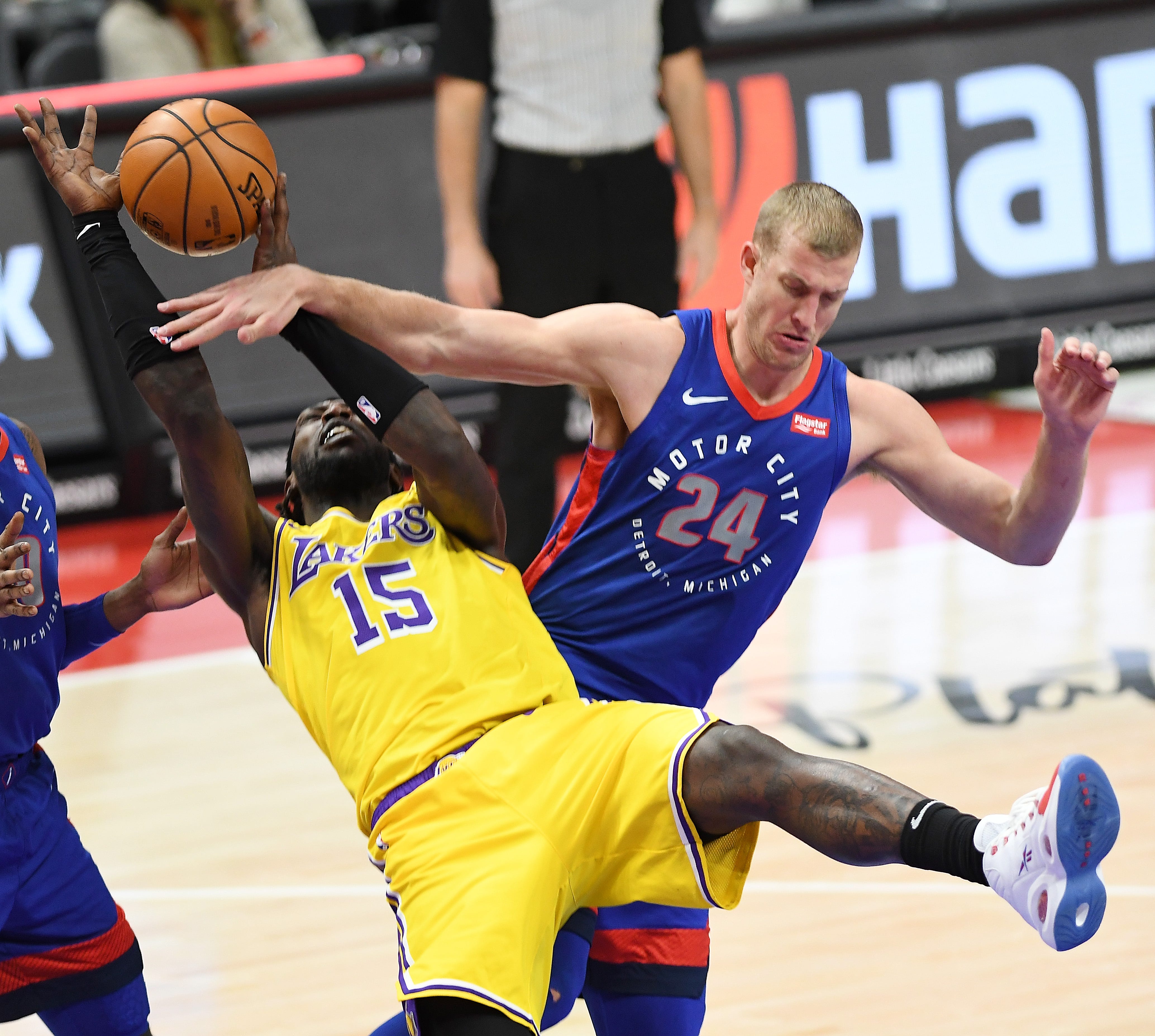 Pistons' Mason Plumlee knocks down and foul Lakers' Montrezl Harrell in the fourth quarter.