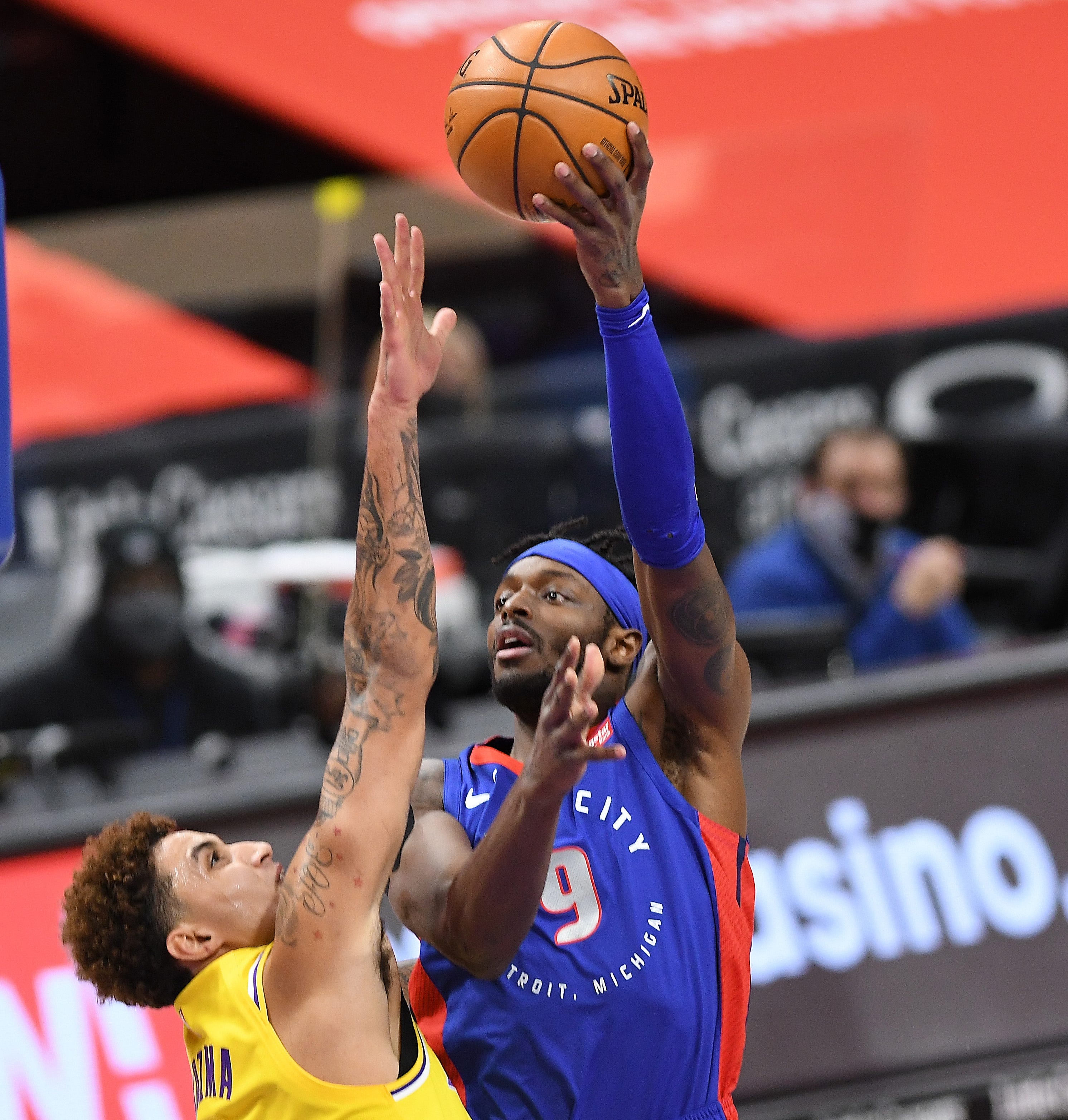Pistons' Jerami Grant shoots over Lakers' Kyle Kuzma in the first quarter.