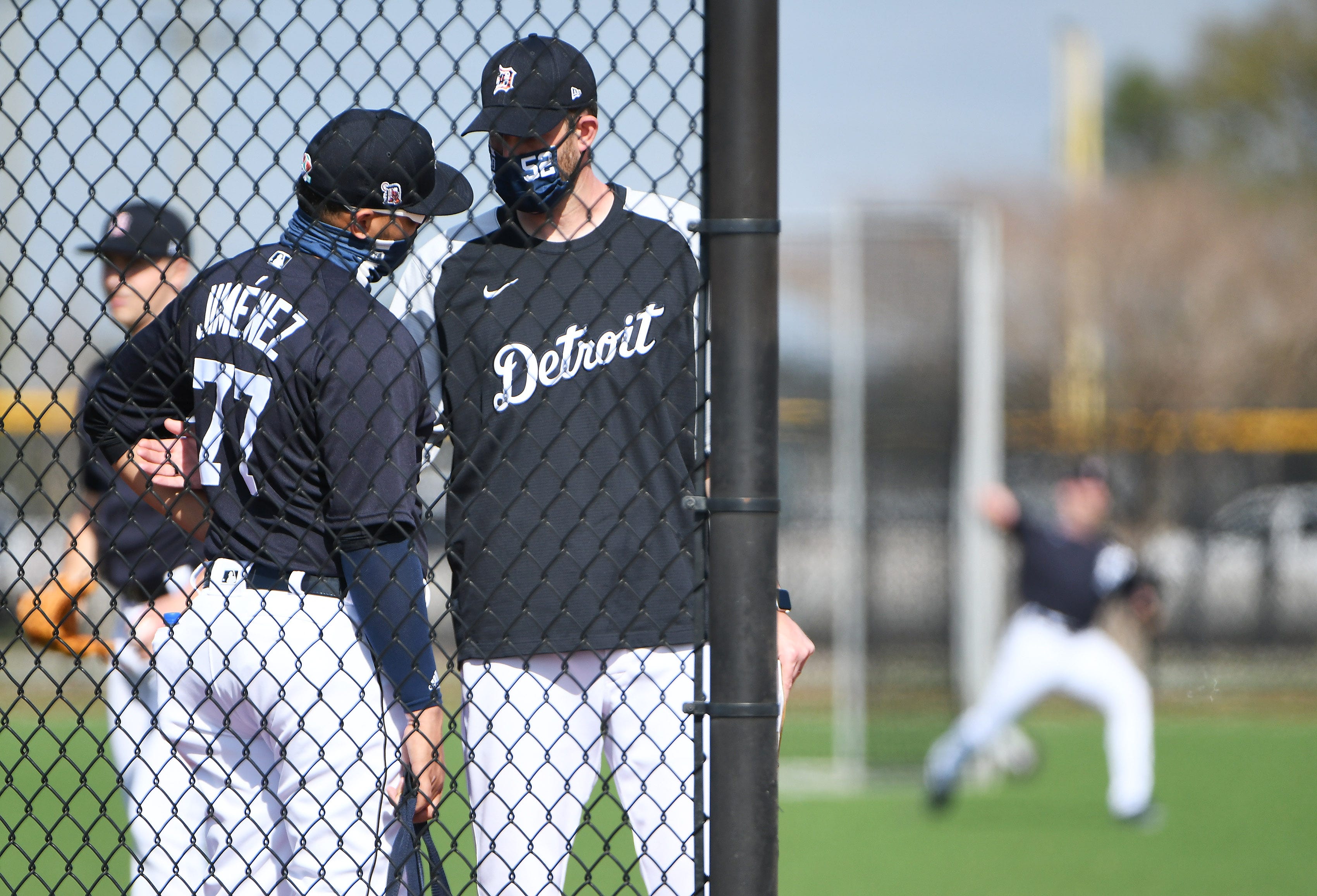 Tigers pitching coach Chris Fetter, right, talks with pitcher Joe Jimenez at the Detroit Tigers workout in Lakeland, Florida, on Feb. 24, 2021.
