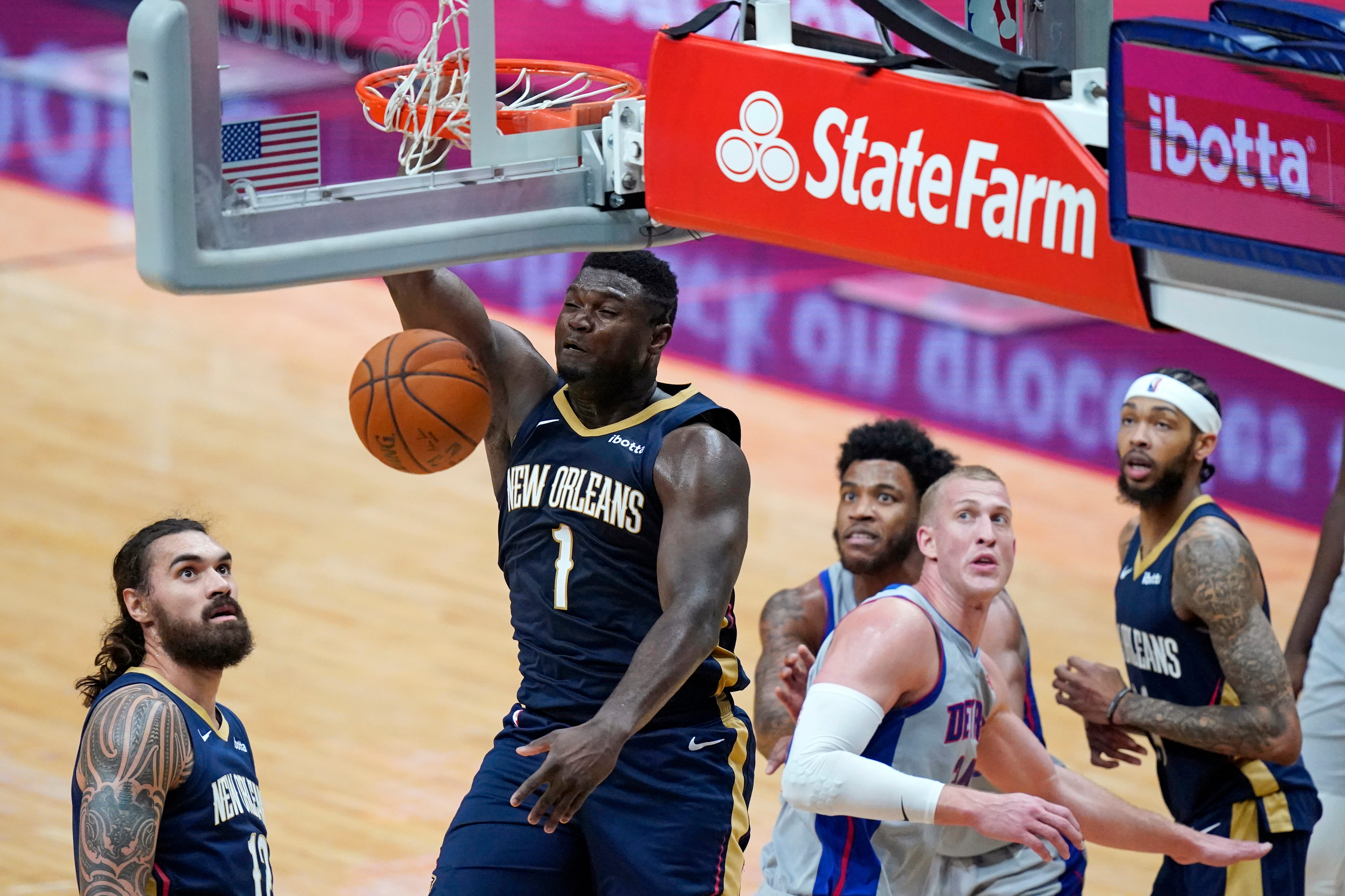 New Orleans Pelicans forward Zion Williamson (1) dunks during the second half of the team's NBA basketball game against the Detroit Pistons in New Orleans, Wednesday, Feb. 24, 2021.