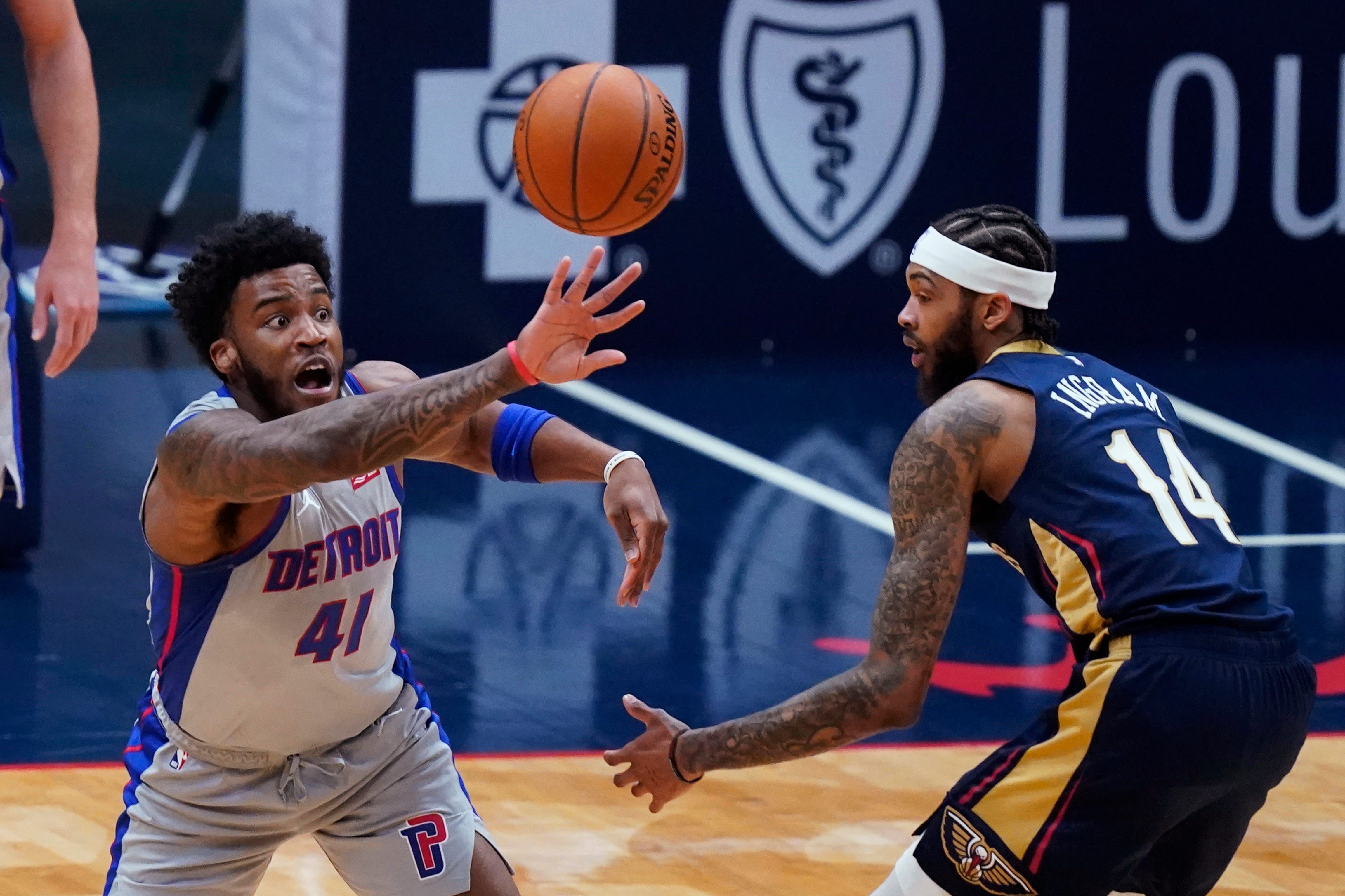 Detroit Pistons forward Saddiq Bey (41) steals the ball from New Orleans Pelicans forward Brandon Ingram (14) during the first half of an NBA basketball game in New Orleans, Wednesday, Feb. 24, 2021.