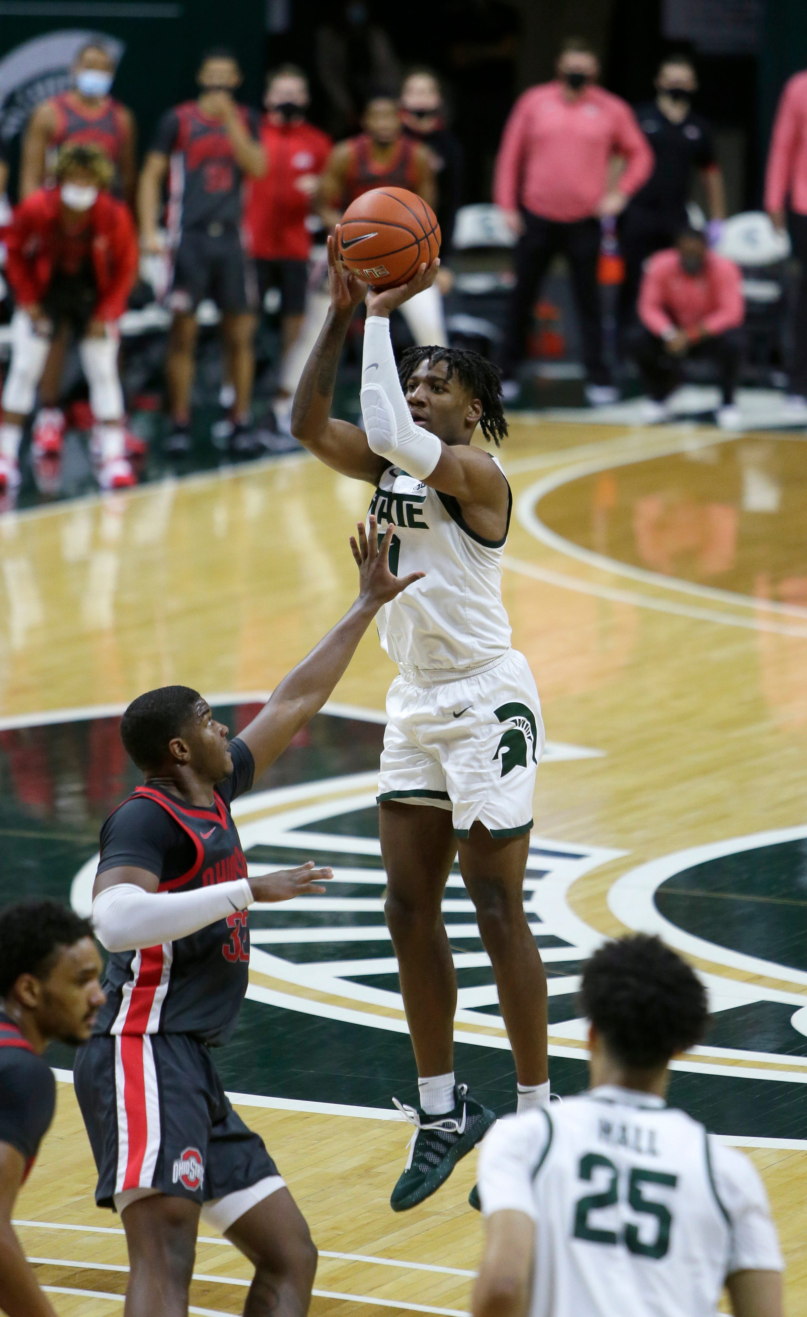 Michigan State forward Aaron Henry takes a shot against Ohio State forward E.J. Liddell (32) during the second half.
