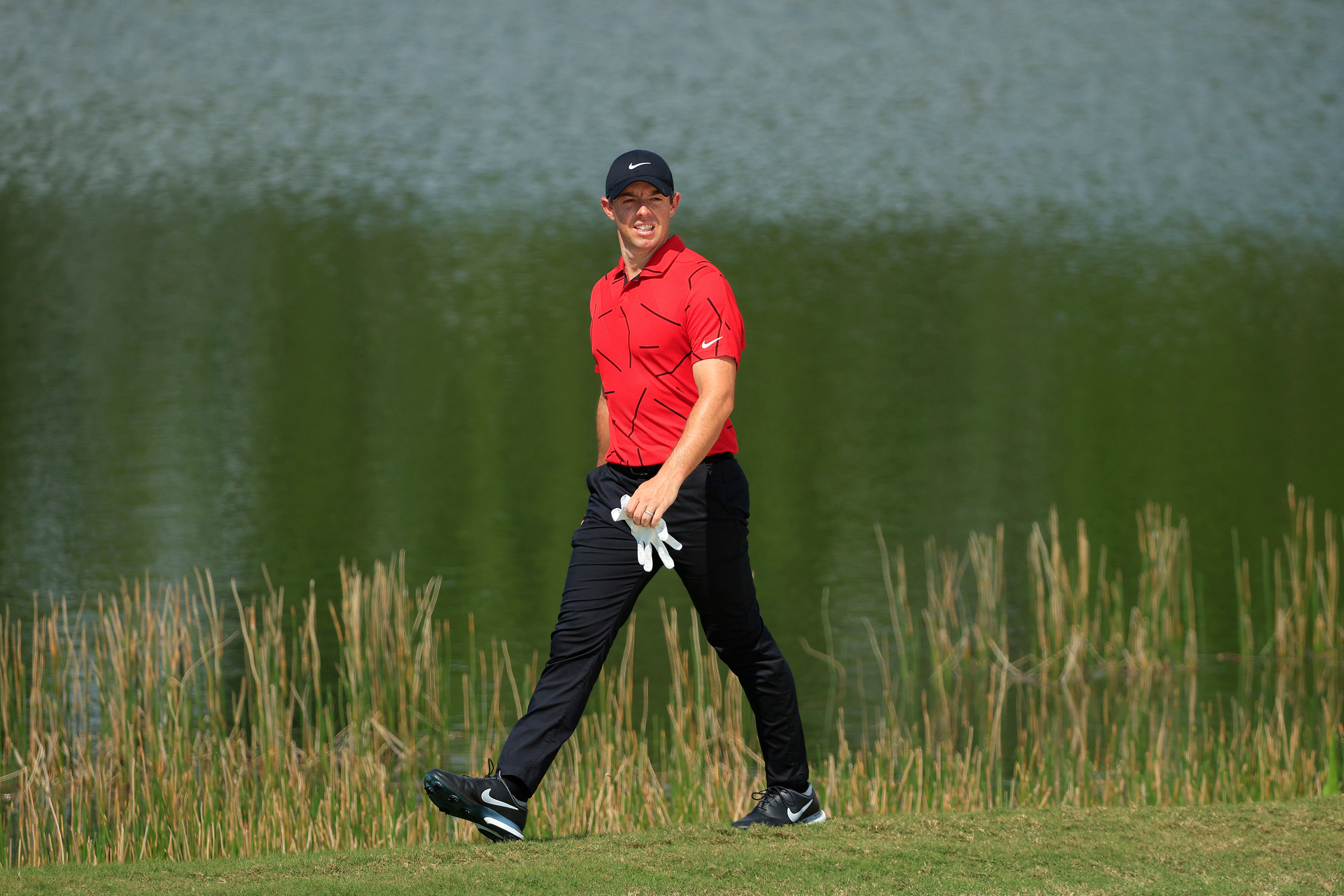 Rory McIlroy, playing the final round of the World Golf Championships-Workday Championship in Bradenton, Florida, was one of several golfers across all three major tours who wore Sunday red and black in honor of Tiger Woods, who was injured in a car accident Monday.