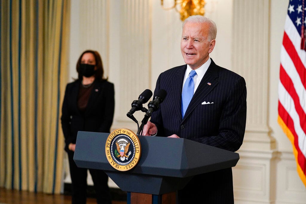 President Joe Biden, accompanied by Vice President Kamala Harris, speaks about efforts to combat COVID-19, in the State Dining Room of the White House, Tuesday, March 2, 2021, in Washington.