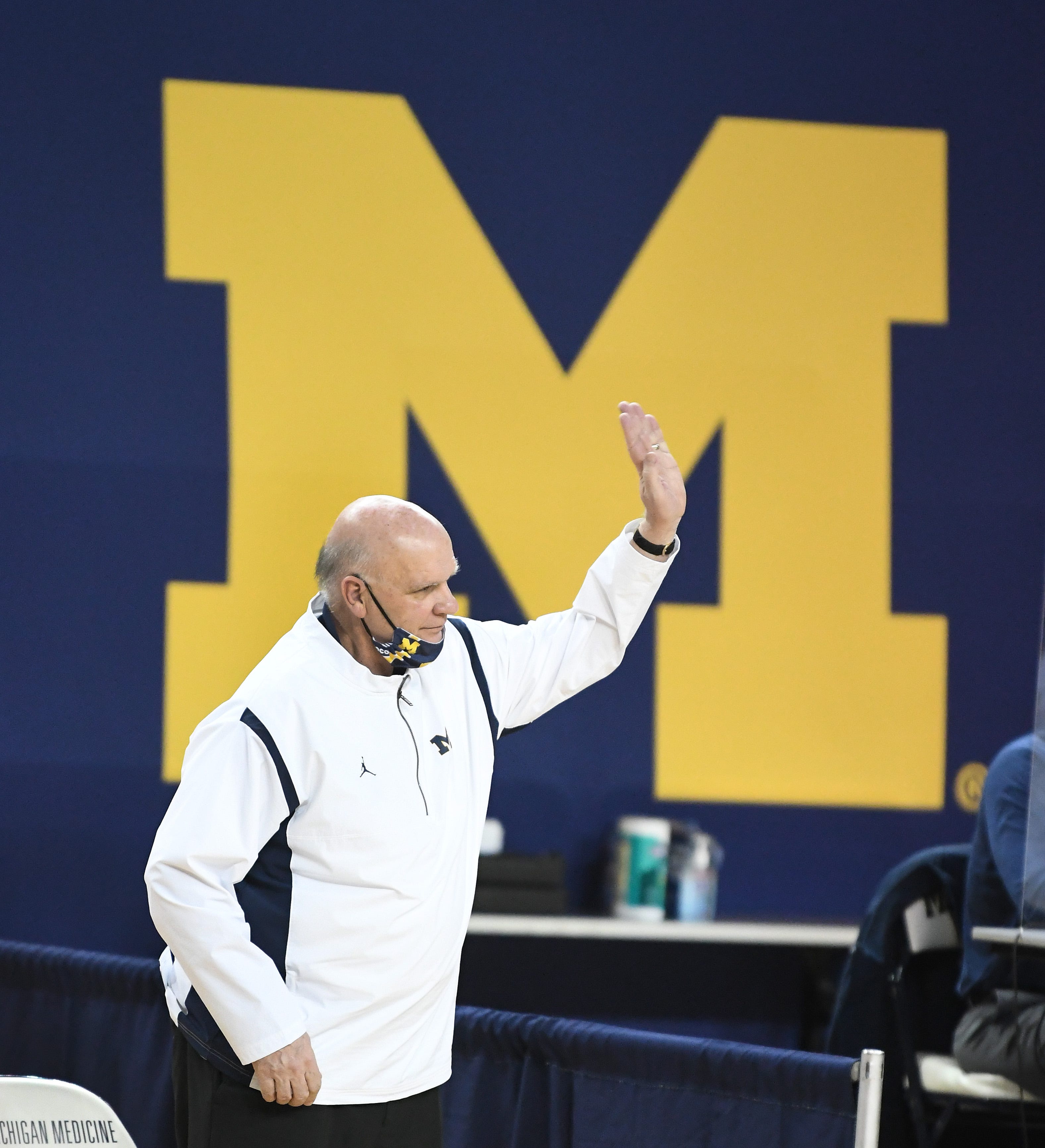 Michigan assistant coach Phil Martelli waves off a refs call late in the second half.  University of Michigan takes on University of Illinois at Crisler Center in Ann Arbor, Michigan on March 2, 2021.  (The Detroit News / Daniel Mears)