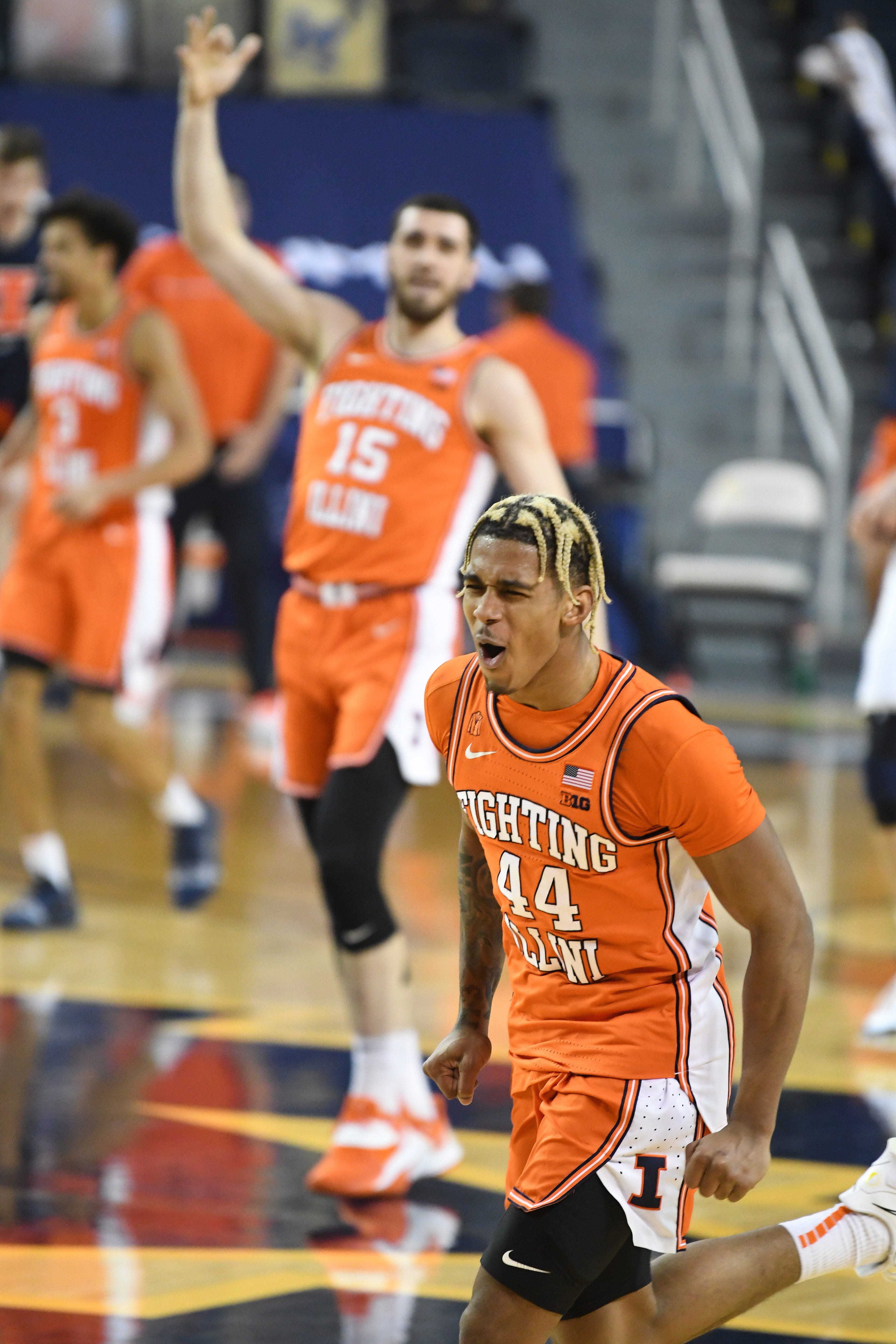 Illinois' Adam Miller reacts after sinking a three in the second half.