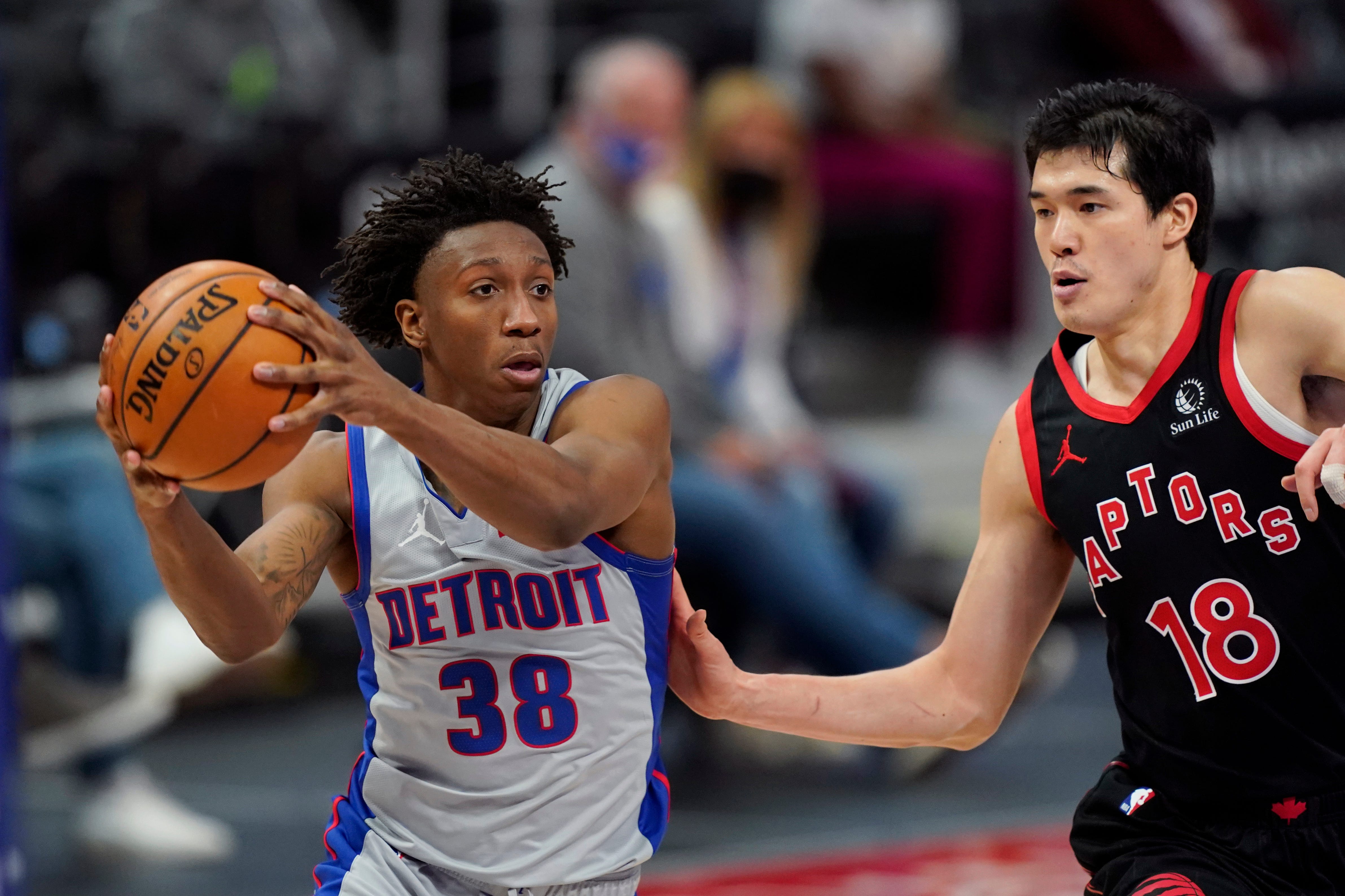 Detroit Pistons guard Saben Lee (38) drives on Toronto Raptors forward Yuta Watanabe (18) during the second half.