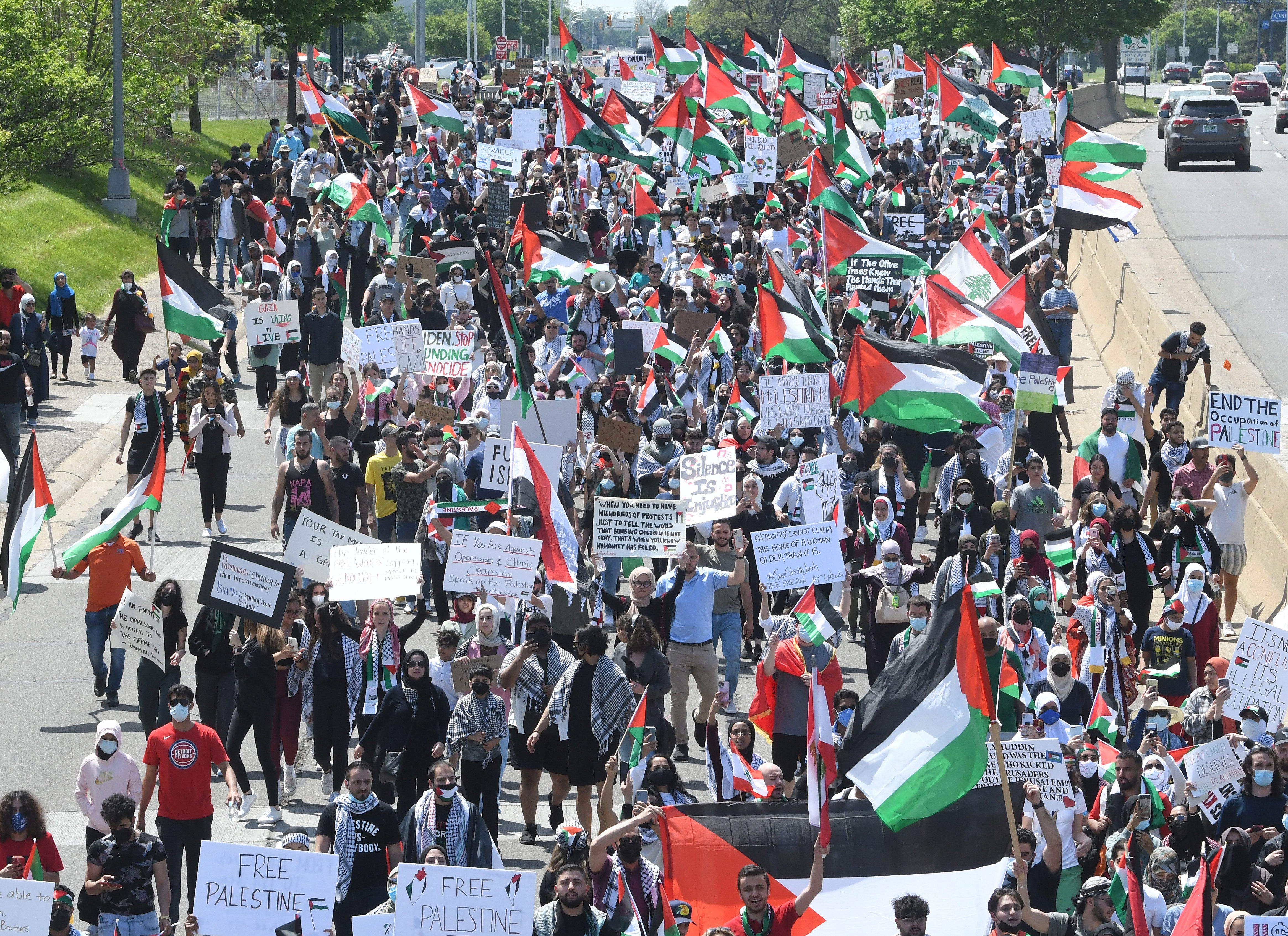 Thousands of Palestinian supporters march down eastbound Michigan Avenue during a Palestinian protest and march, at the same time President Joe Biden is visiting in another part of Dearborn, Michigan on May 18, 2021.