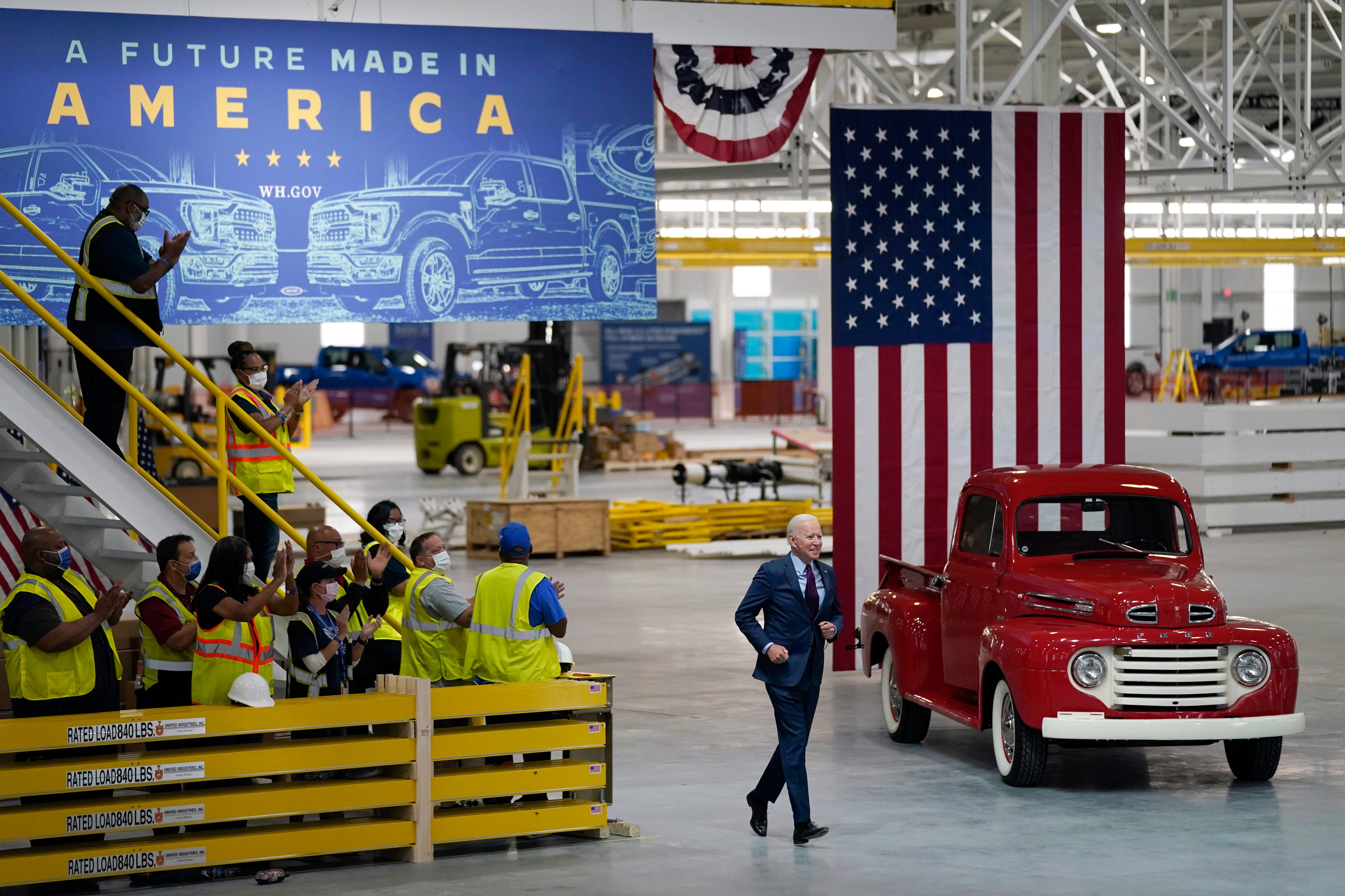 President Joe Biden arrives to speak after a tour of the Ford Rouge EV Center, Tuesday, May 18, 2021, in Dearborn, Mich.