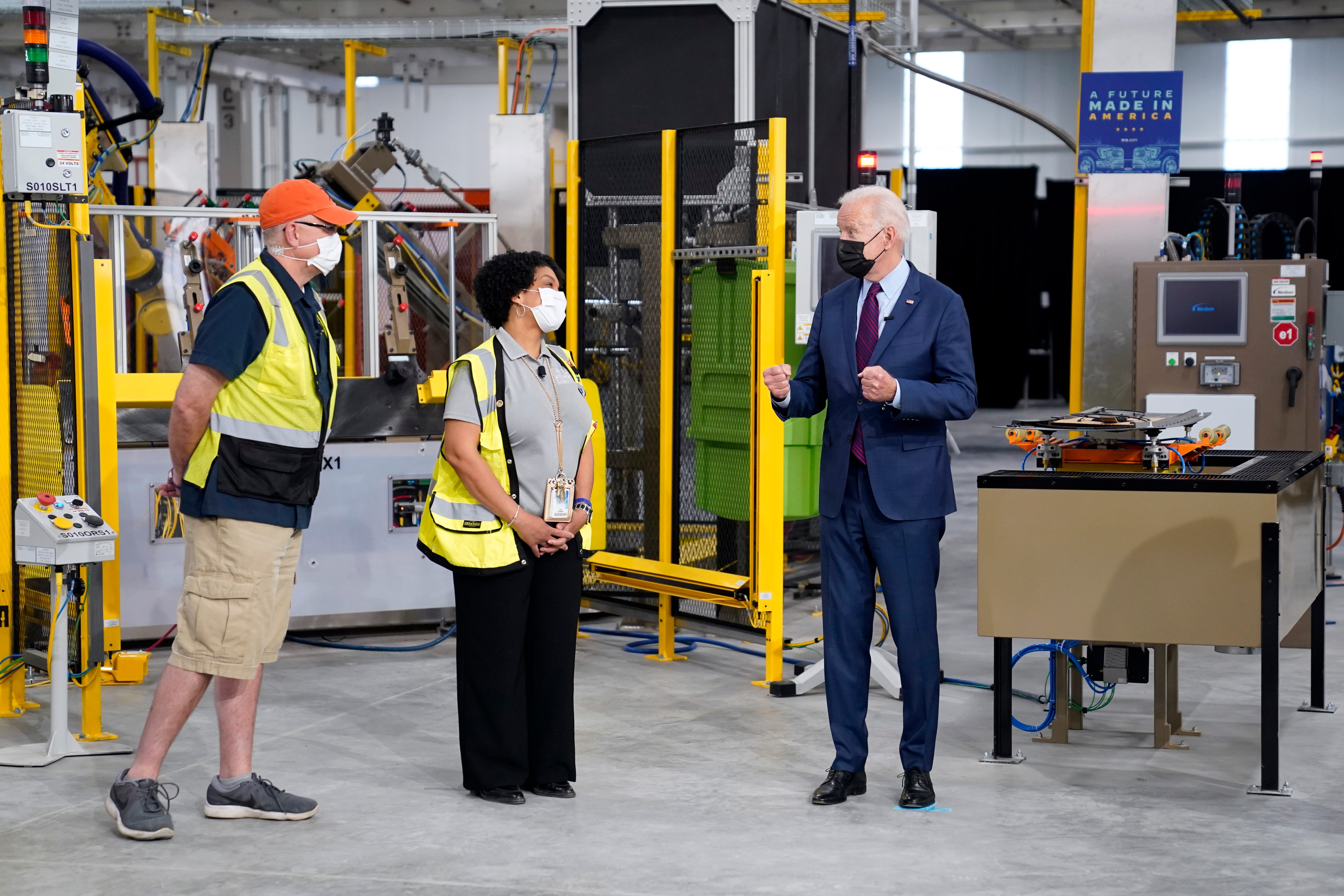 President Joe Biden tours the Ford Rouge EV Center in Dearborn, Tuesday.