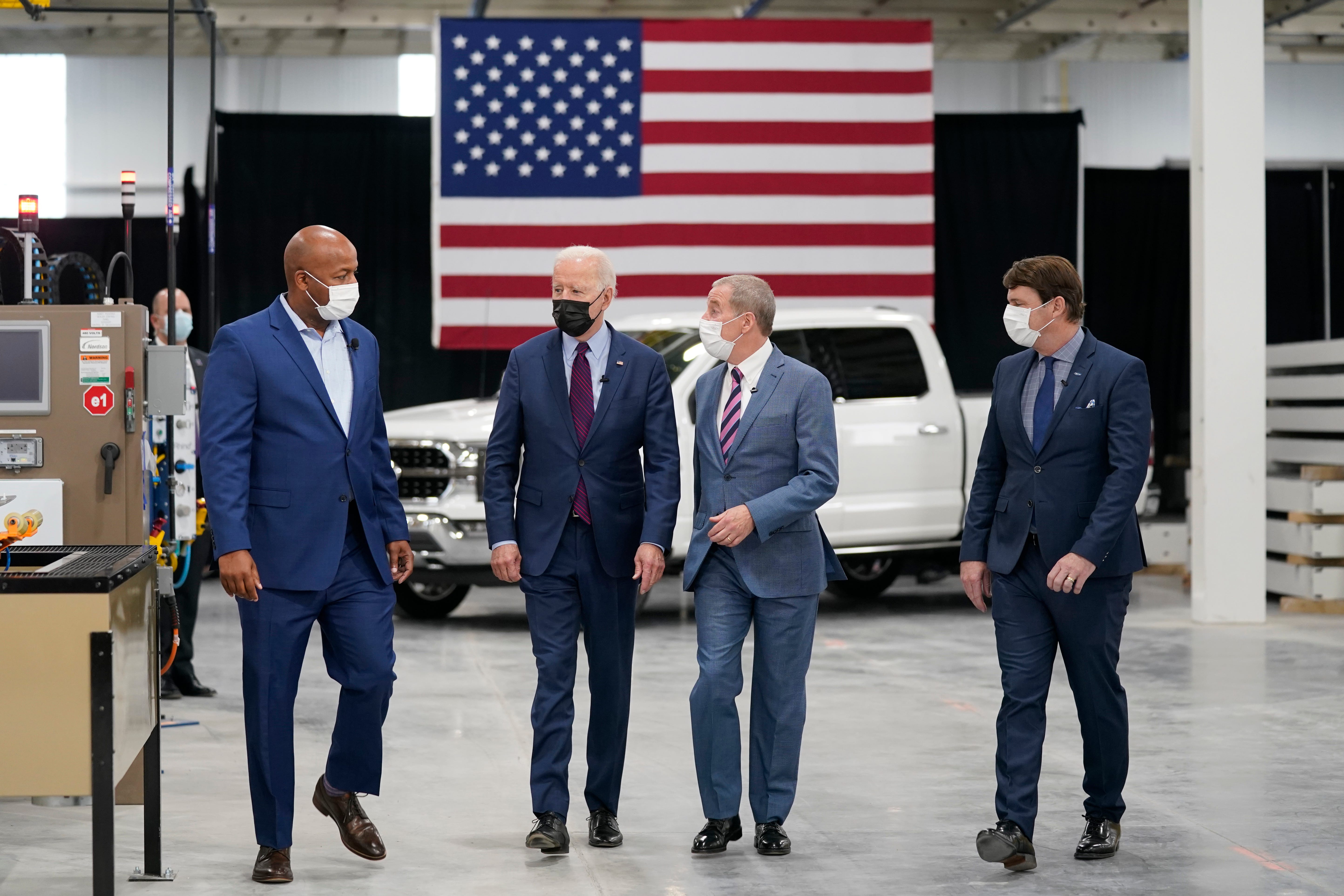 President Joe Biden tours the Ford Rouge EV Center, Tuesday, May 18, 2021, in Dearborn, Mich. From left, Corey Williams, plant manager, Biden, William "Bill" Ford, Jr., Executive Chairman, Ford Motor Company and Jim Farley, CEO, Ford Motor Company.