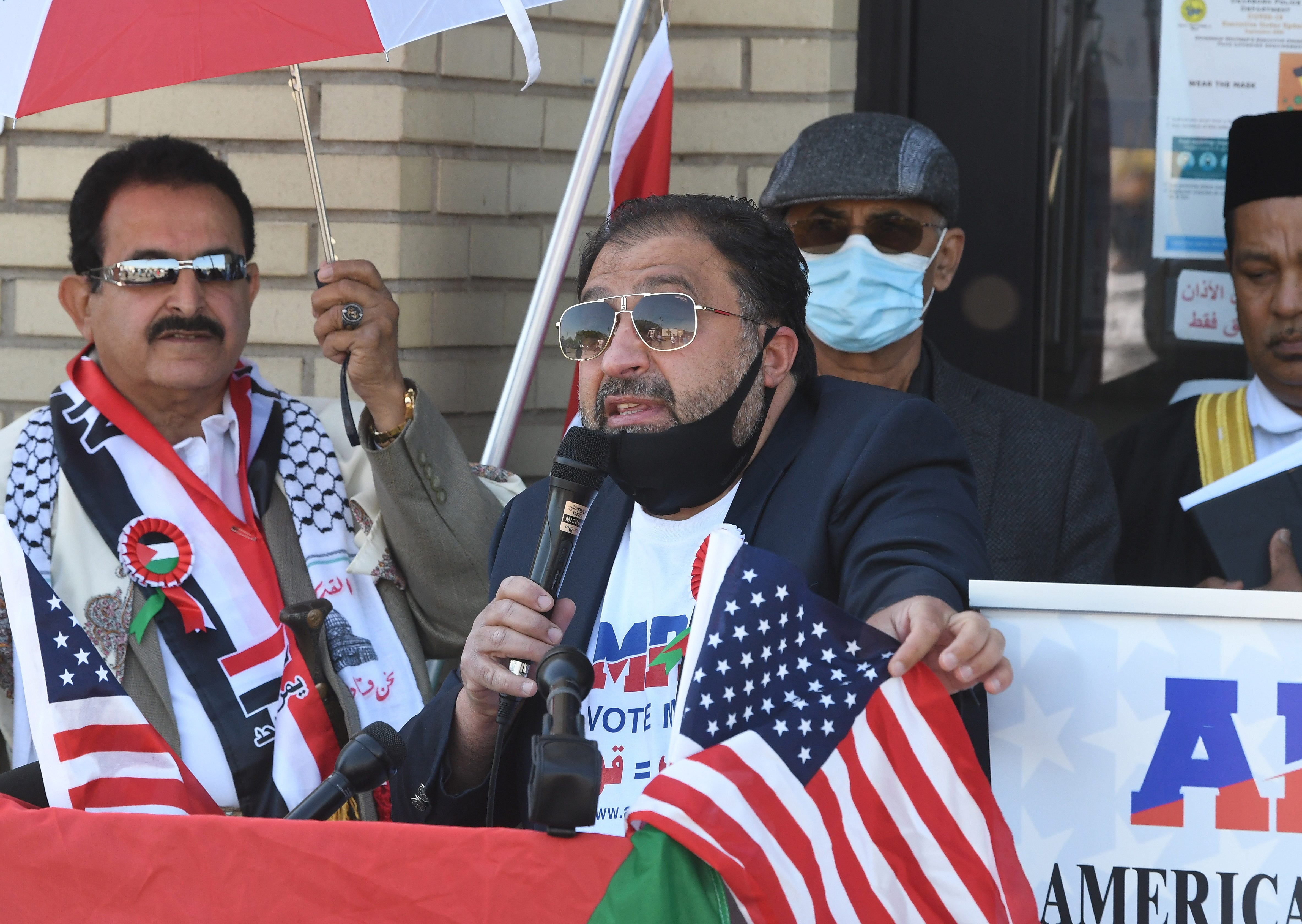 "This flag means justice, this flag means fairness," comments Abdallah Sheik, president of the American Muslim Political Action Committee, AMPAC during a news conference to urge the Biden administration take immediate action at the AMS Mosque in Dearborn, Michigan on May 18, 2021.