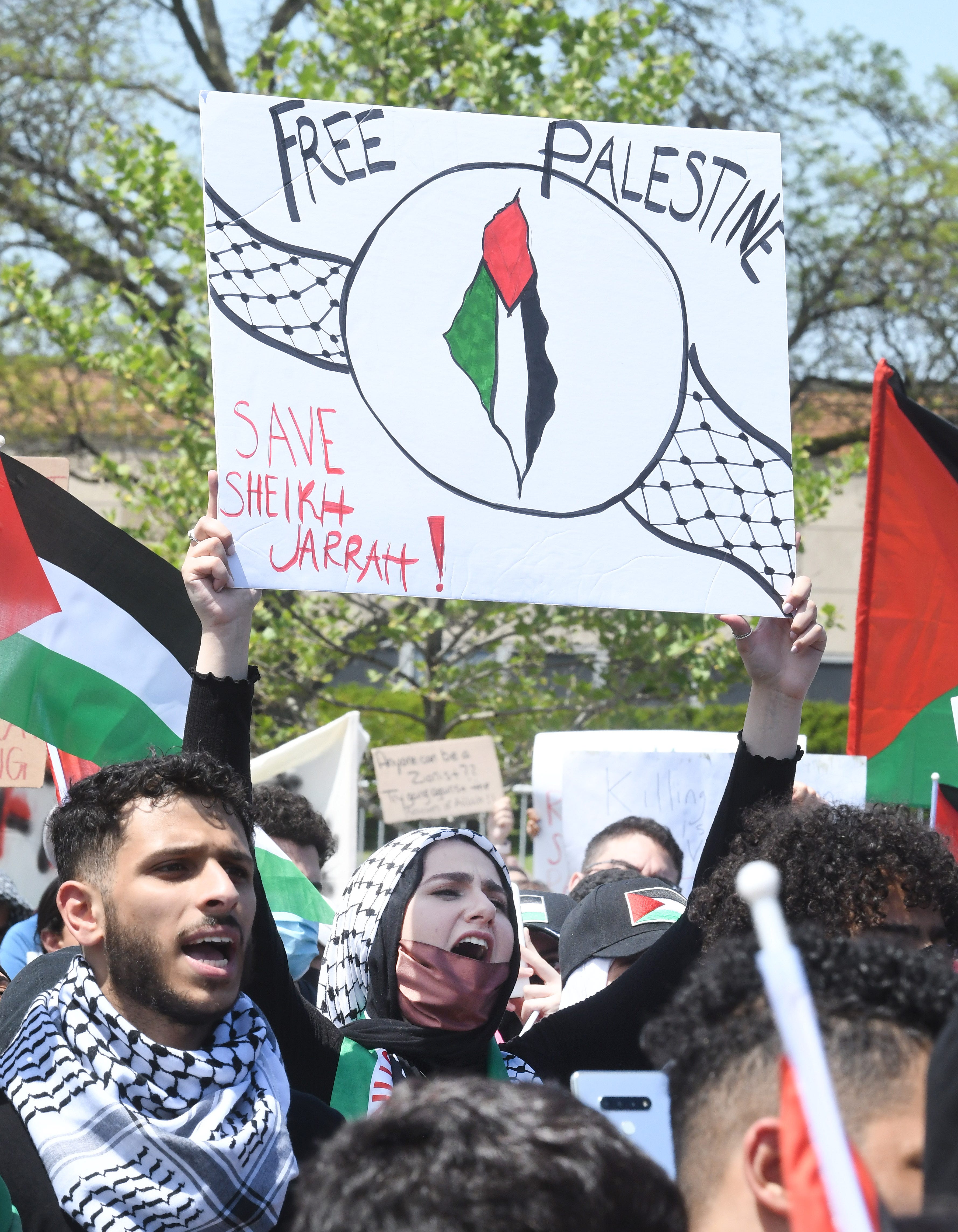 Thousands of Palestinian supporters listen to speakers during Palestinian protest and march, at the same time President Joe Biden is visiting in another part of Dearborn, Michigan on May 18, 2021.