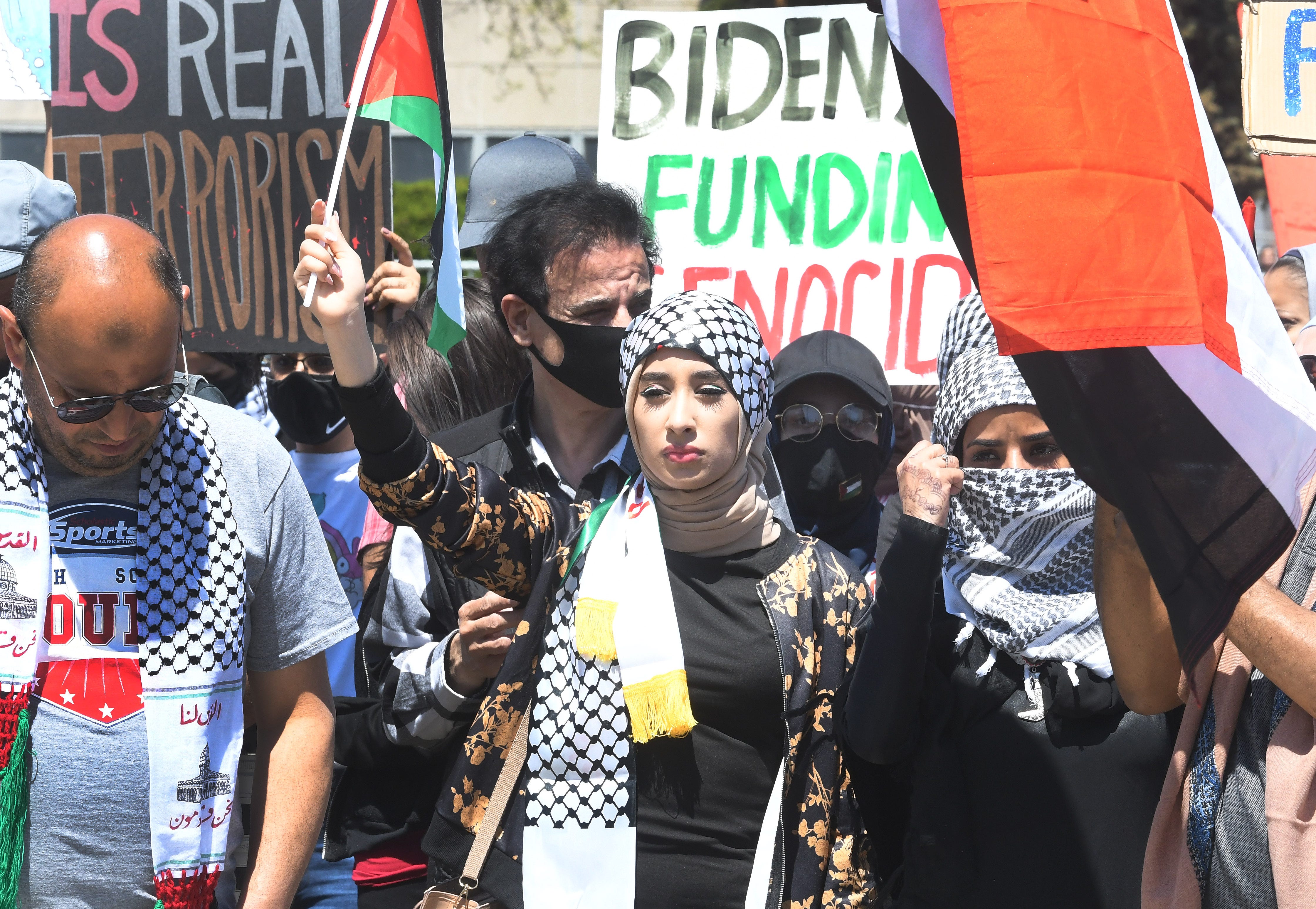 Tharwa Abdulmalik amongst thousands at a Palestinian protest and march, at the same time President Joe Biden is visiting in another part of Dearborn, Michigan on May 18, 2021.