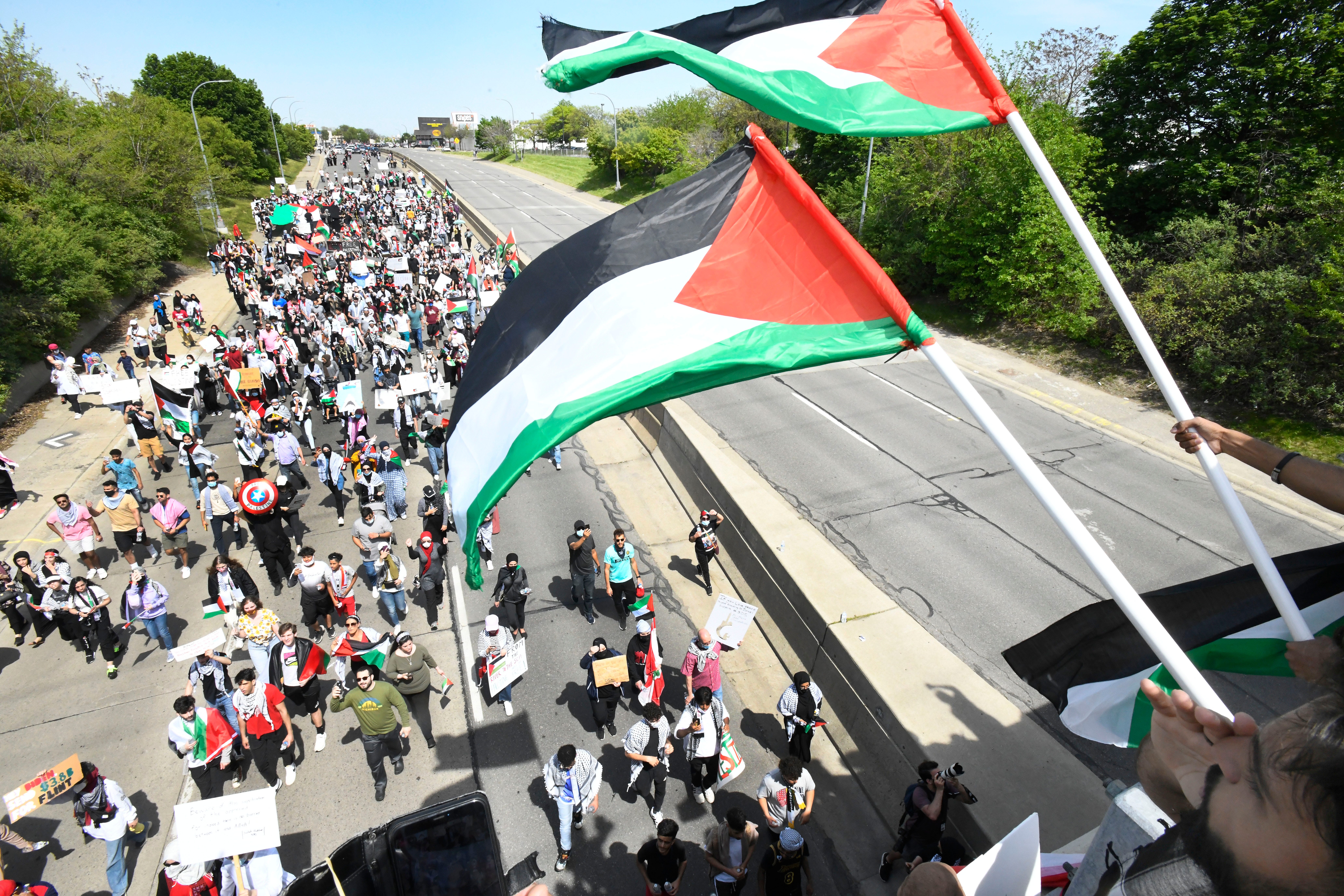 Thousands of Palestinian supporters march down westbound Michigan Avenue during a Palestinian protest and march, at the same time President Joe Biden is visiting in another part of Dearborn, Michigan on May 18, 2021.