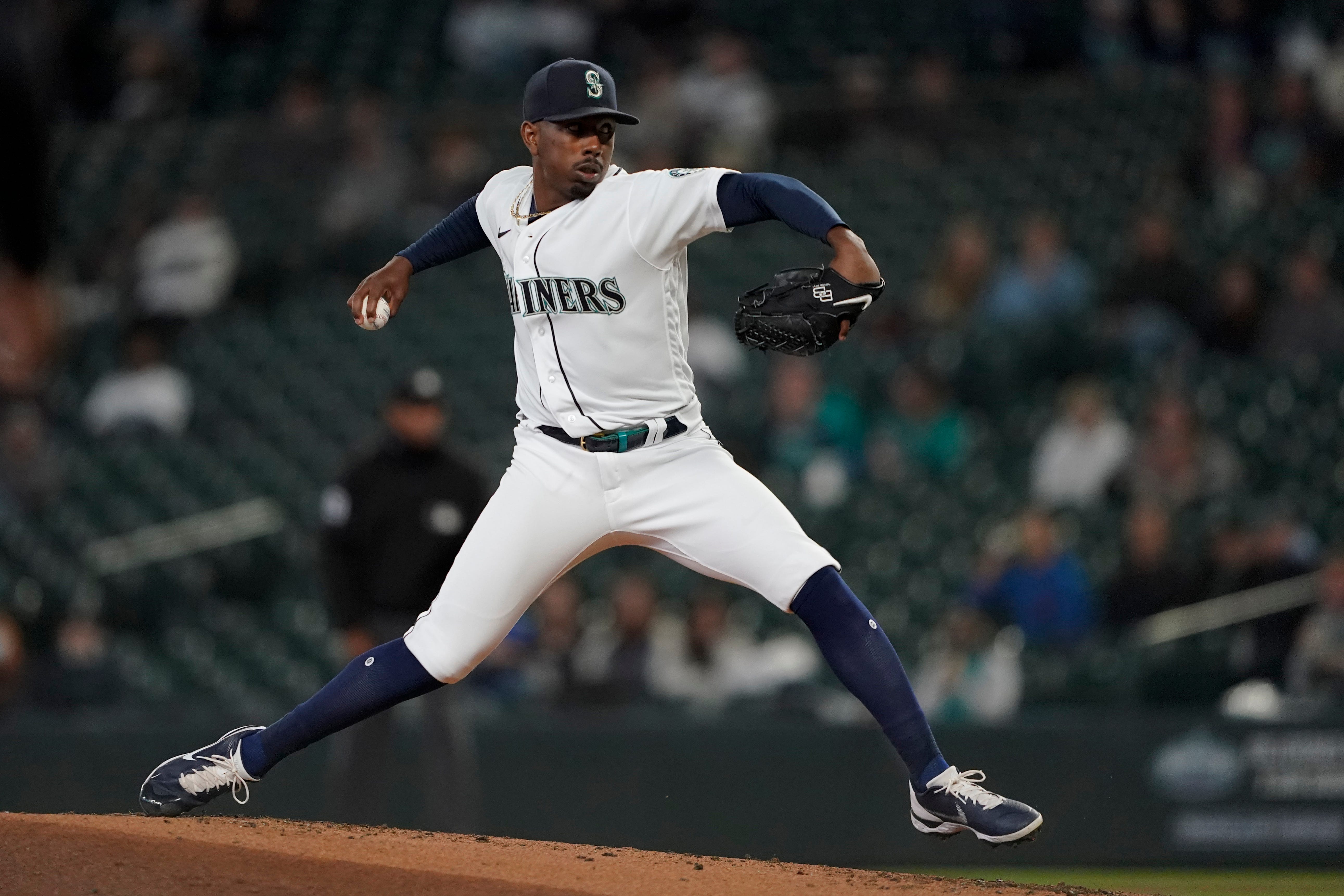 Seattle Mariners starting pitcher Justin Dunn throws to a Detroit Tigers batter during the third inning.