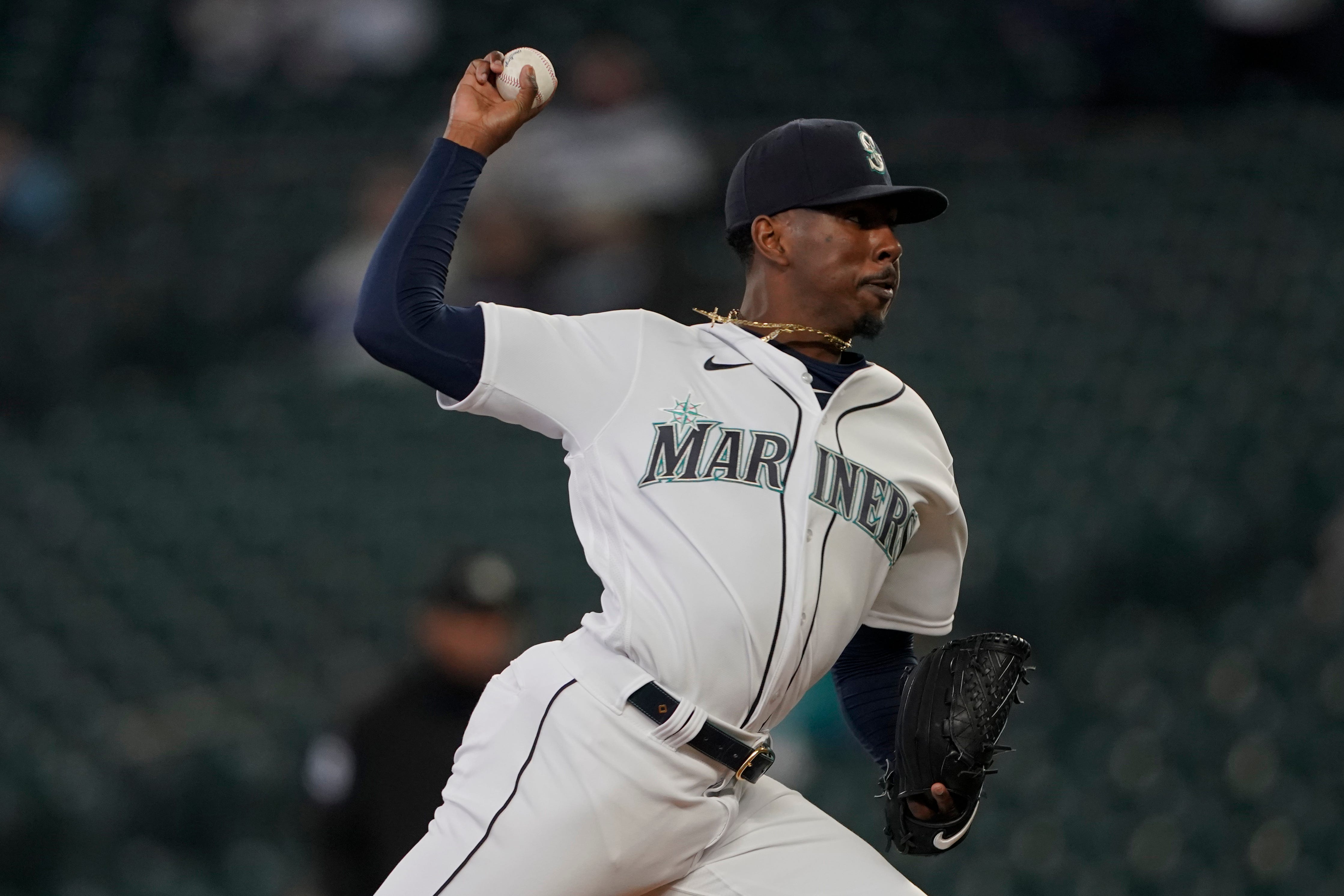 Seattle Mariners starting pitcher Justin Dunn throws to a Detroit Tigers batter during the first inning.