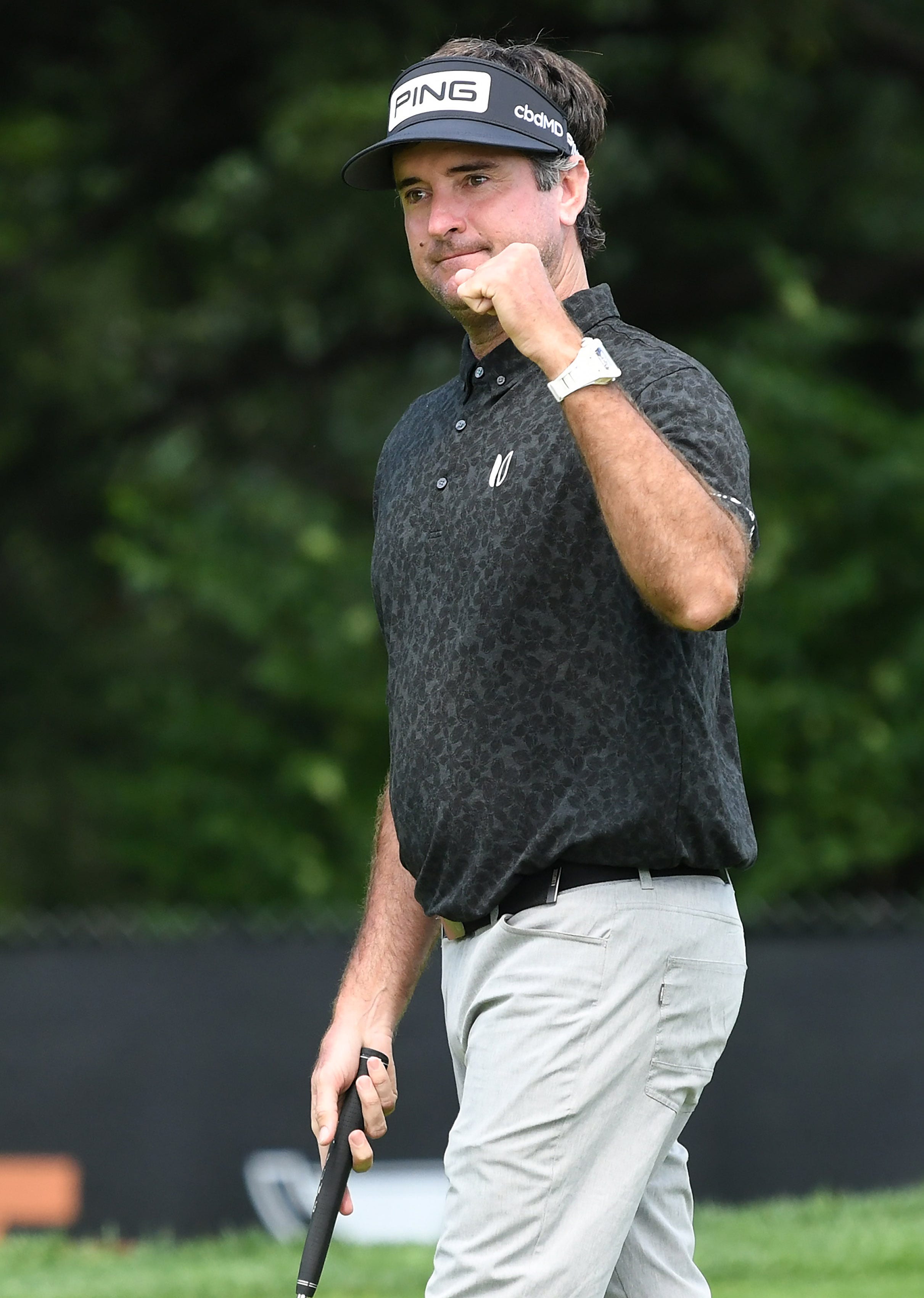 Bubba Watson reacts after he birdies the ninth hole in Round 1.