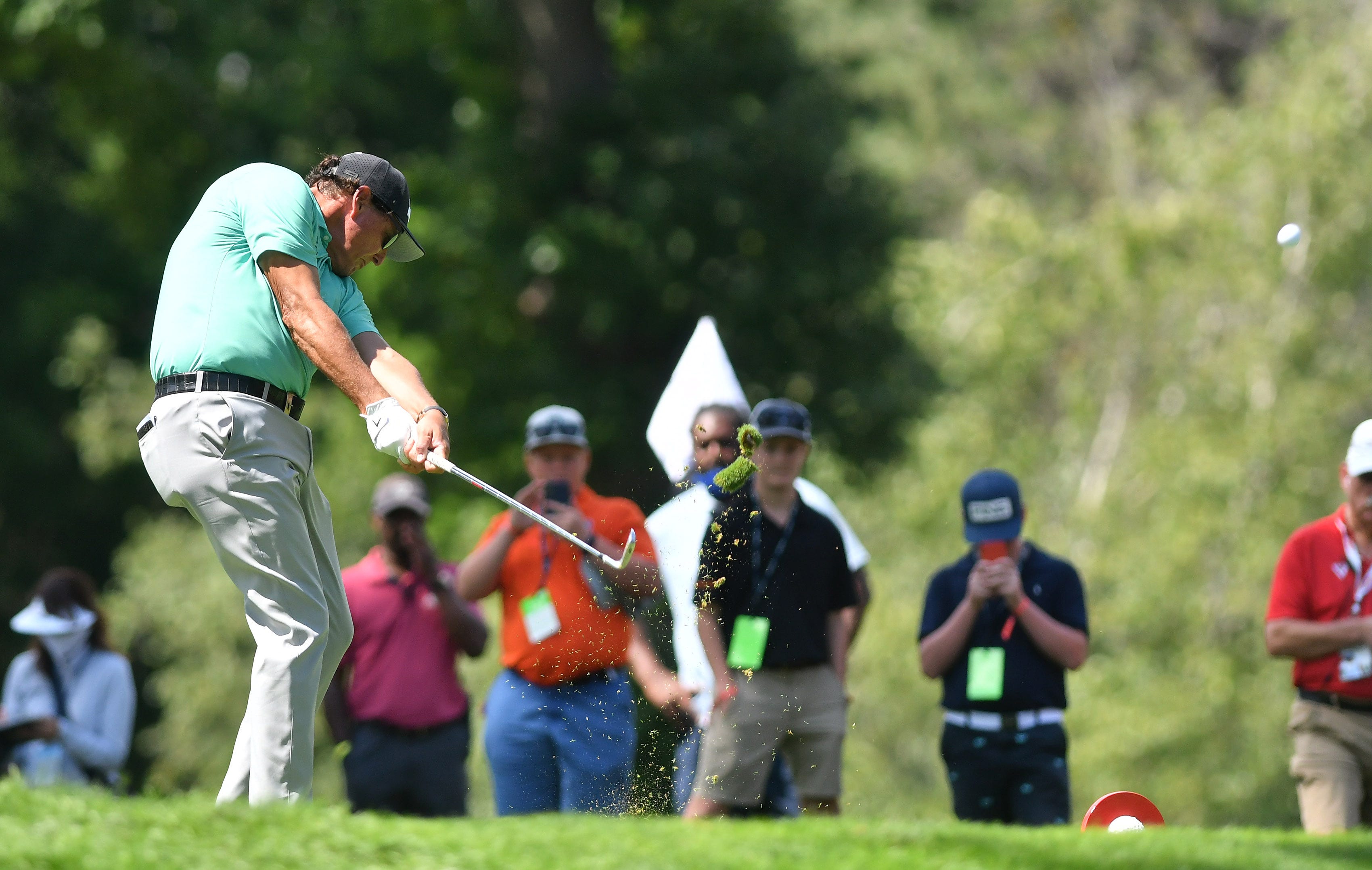 Phil Mickelson tees off on hole No. 9.