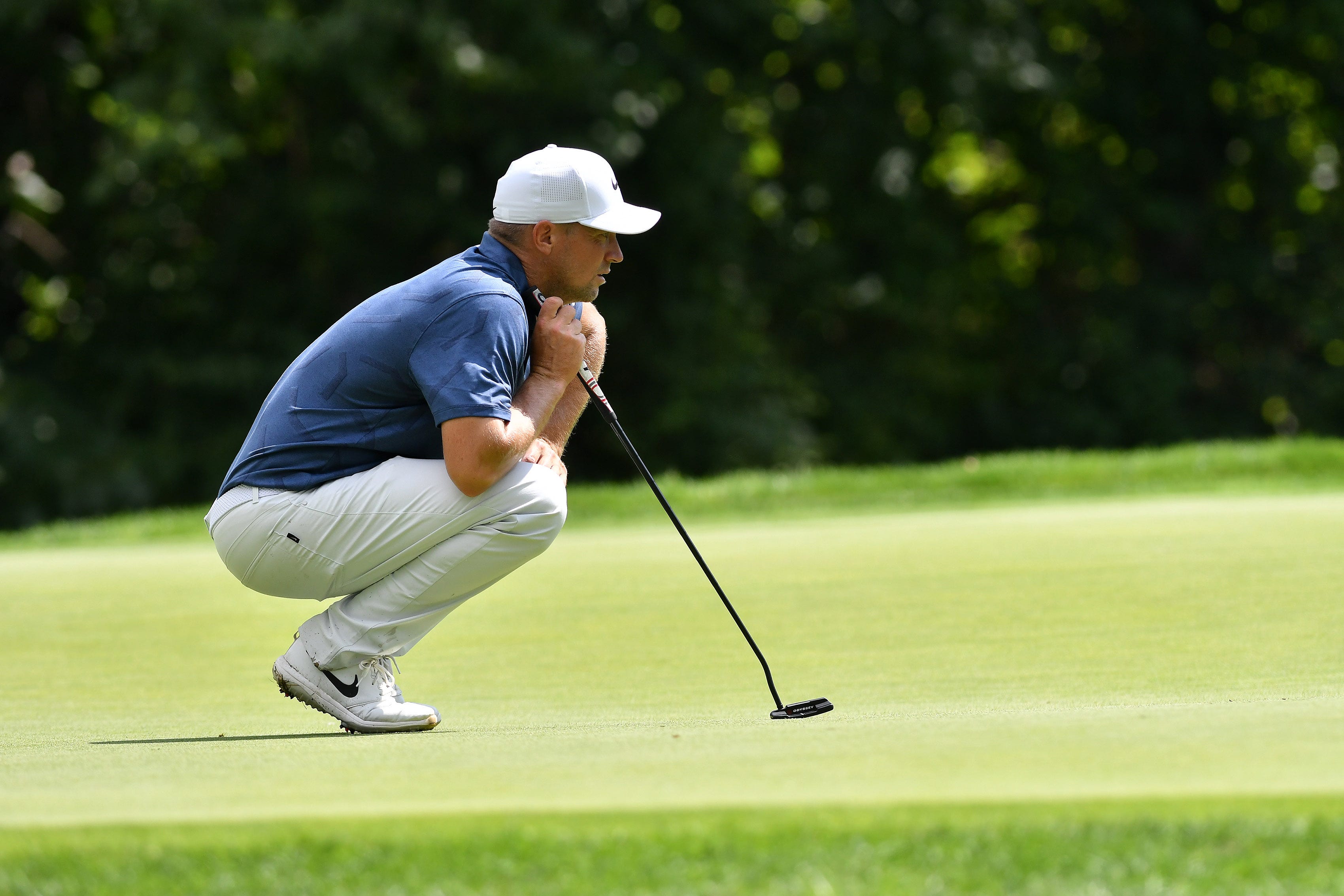 Alex Noren looks over his situation on the eighth green.