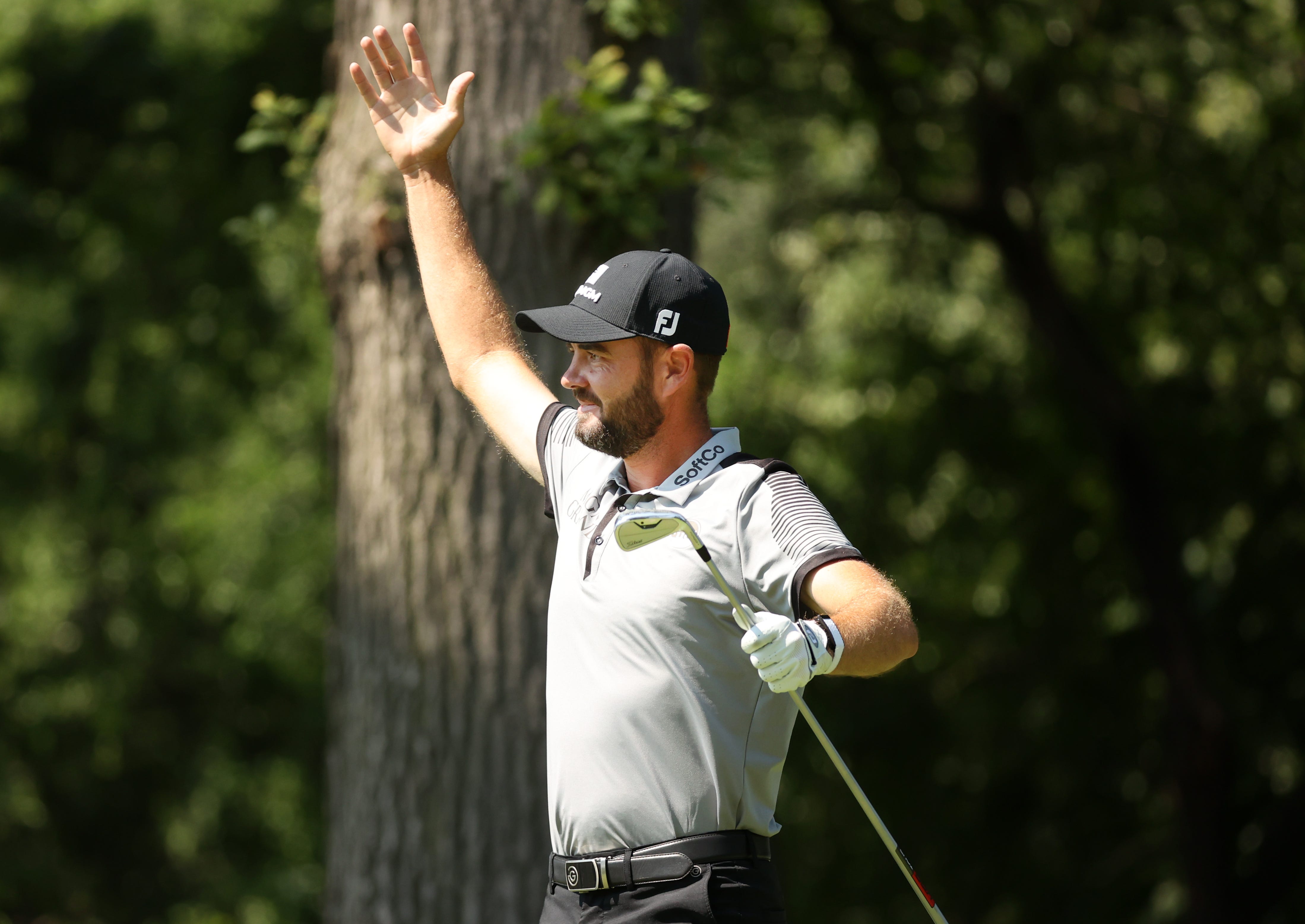 Troy Merritt celebrates his ace at the 2021 Rocket Mortgage Classic.