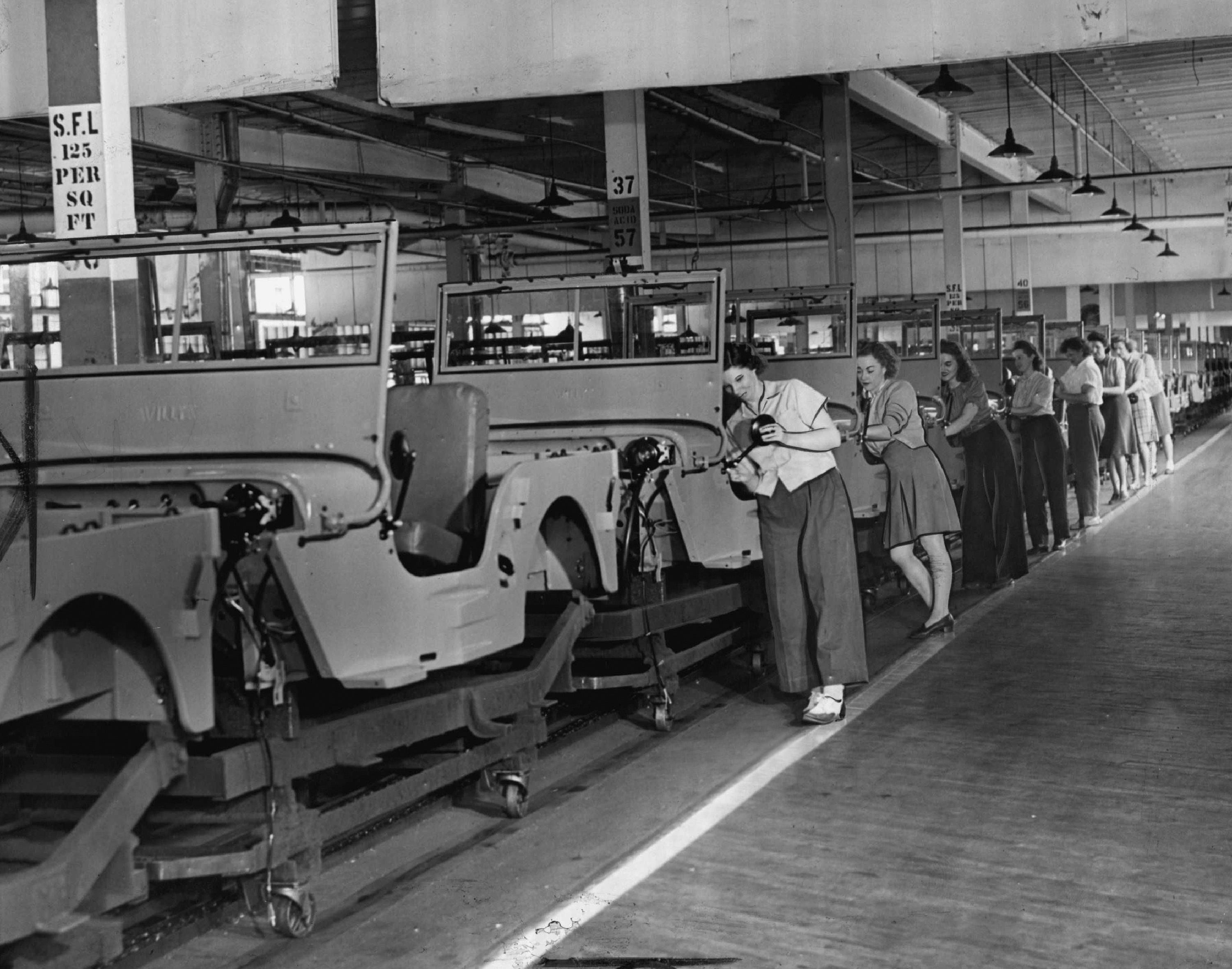 July 1945: Assembly lines of Jeeps begin to be converted for civilian use at the Willys-Overland plant in Toledo, Ohio.