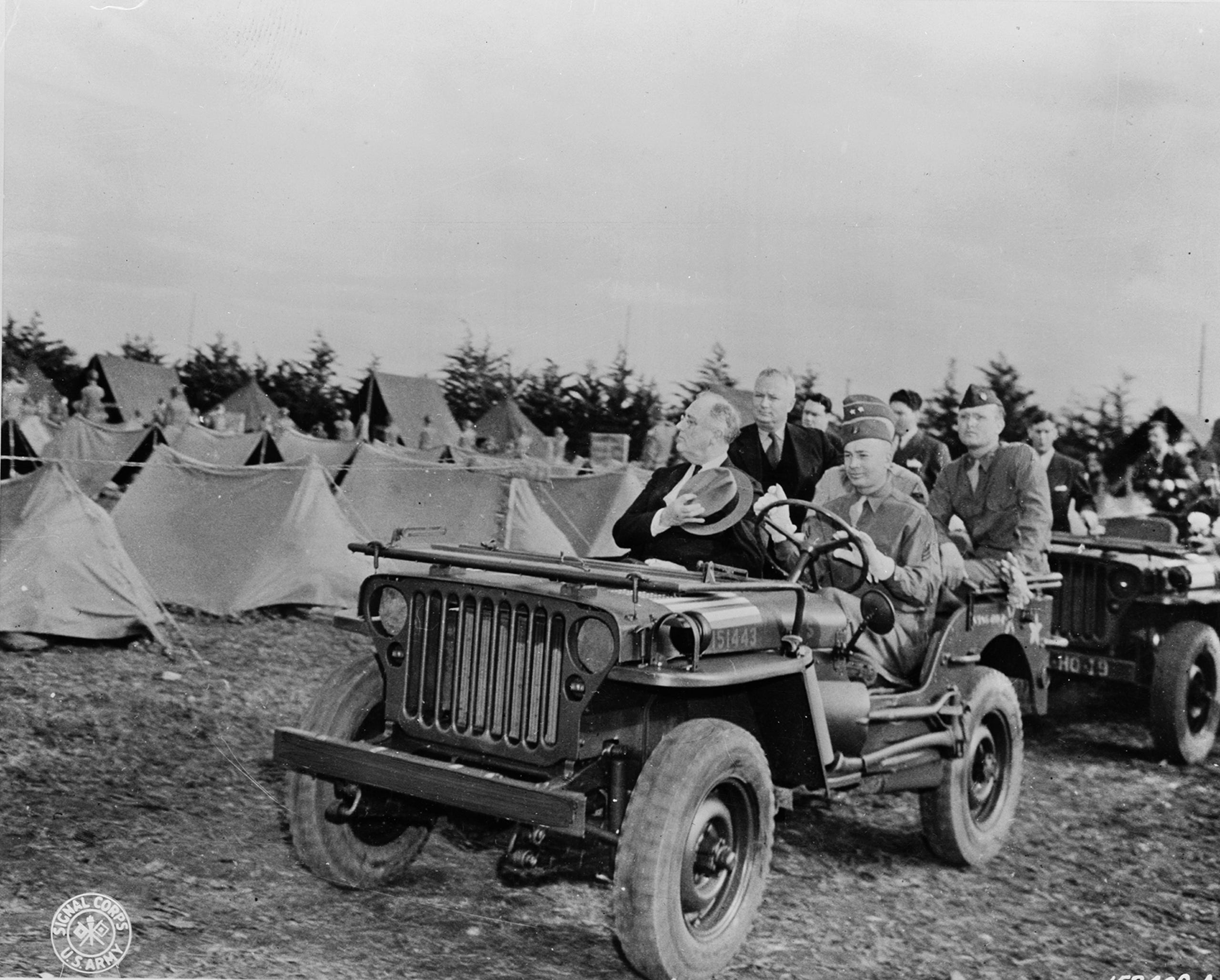 President Franklin Roosevelt reviews American troops from an Army jeep in Casablanca, Morocco, in January, 1943.