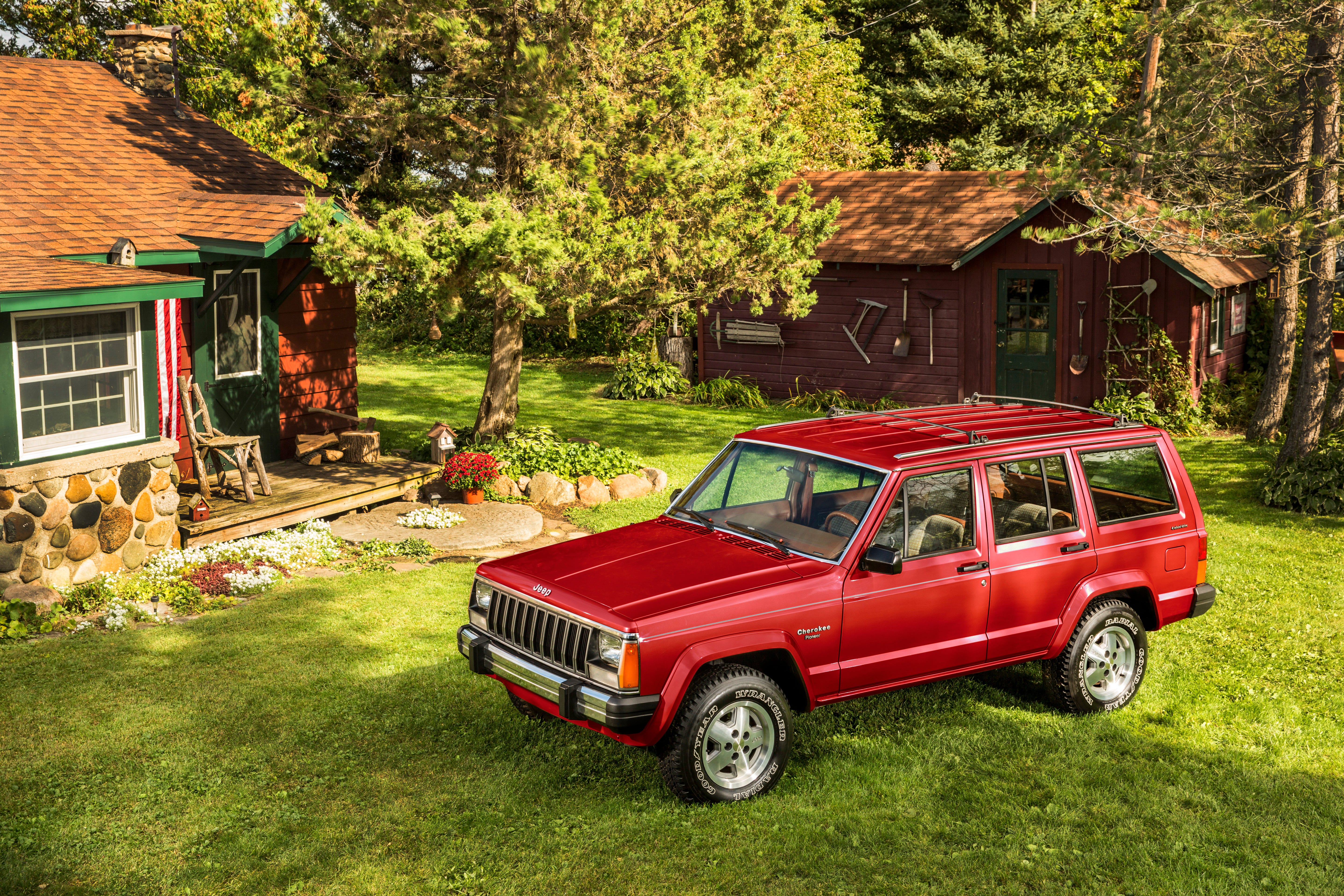 1984-2001 Jeep Cherokee (XJ): AMC's first Jeep design from scratch, and the first all-new Jeep wagon since the Wagoneer, was the Cherokee, or XJ series. The XJs used a hybrid of frame and uni-body construction, a new 'Quadra-Link' front suspension to retain the durability of a solid front axle while improving handling and ride, and robotic assembly to improve fit and finish. A half-ton lighter than the old Cherokee, 4 inches lower (10 cm), 6 inches (15 cm) narrower and an incredible 21 (53 cm) inches shorter, the XJs had 90 percent of the old Cherokee's capacity. Available with two 2WD/4WD systems, SelecTrac and shift-on-the-fly CommandTrac and four doors. Cherokee dominated its market segment for years. Cherokee Limited debuted in 1988 and a 4.0-liter I-6 was introduced in 1989.