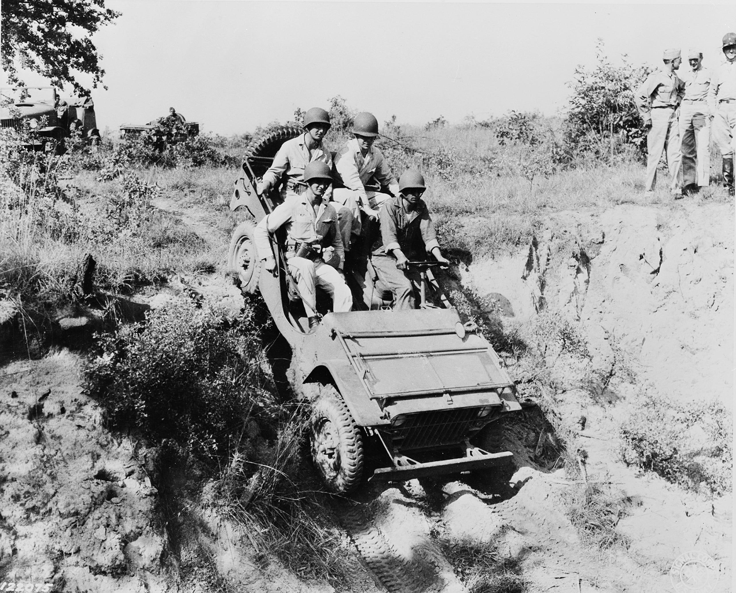 West Point cadets and a U.S. Army soldier drive a Jeep at Fort Benning, Georgia, in 1942. The rugged Jeep brand dates back to 1940, when the Army solicited bids for a 1/4 ton "light reconnaissance" vehicle.