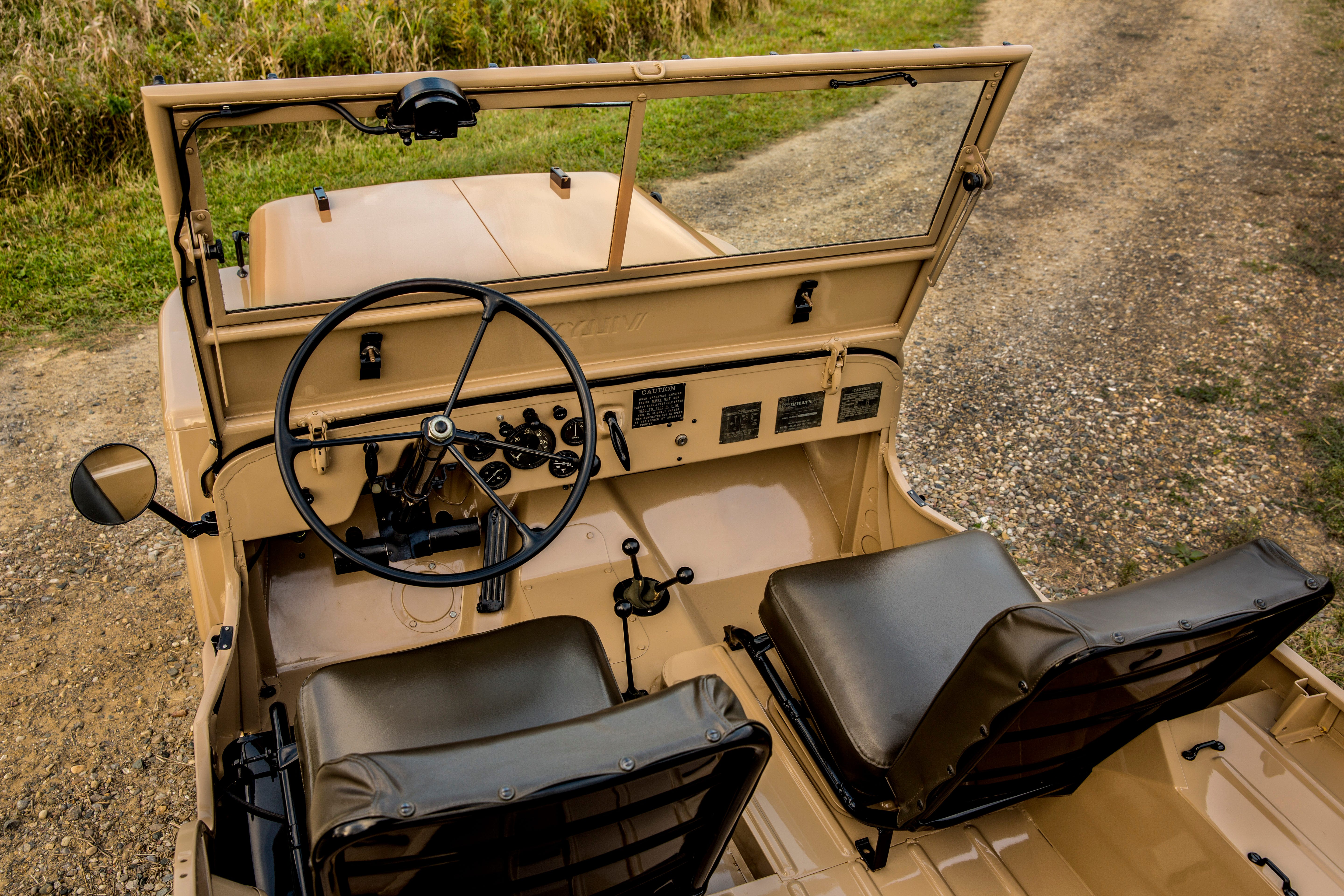 1945-1949 Jeep CJ-2A: The first civilian Jeep vehicle, the CJ-2A, was produced in 1945. It came with a tailgate, side-mounted spare tire, larger headlights, an external fuel cap and many more items that its military predecessors did not include. Several CJ-2A features – such as a 134-cubic-inch I-4 engine, a T-90A transmission, Spicer 18 transfer case and a full-floating Dana 25 front and Dana 23-2 rear axle – were found on numerous Jeep vehicles in future years. The CJ-2A was produced for four years.
