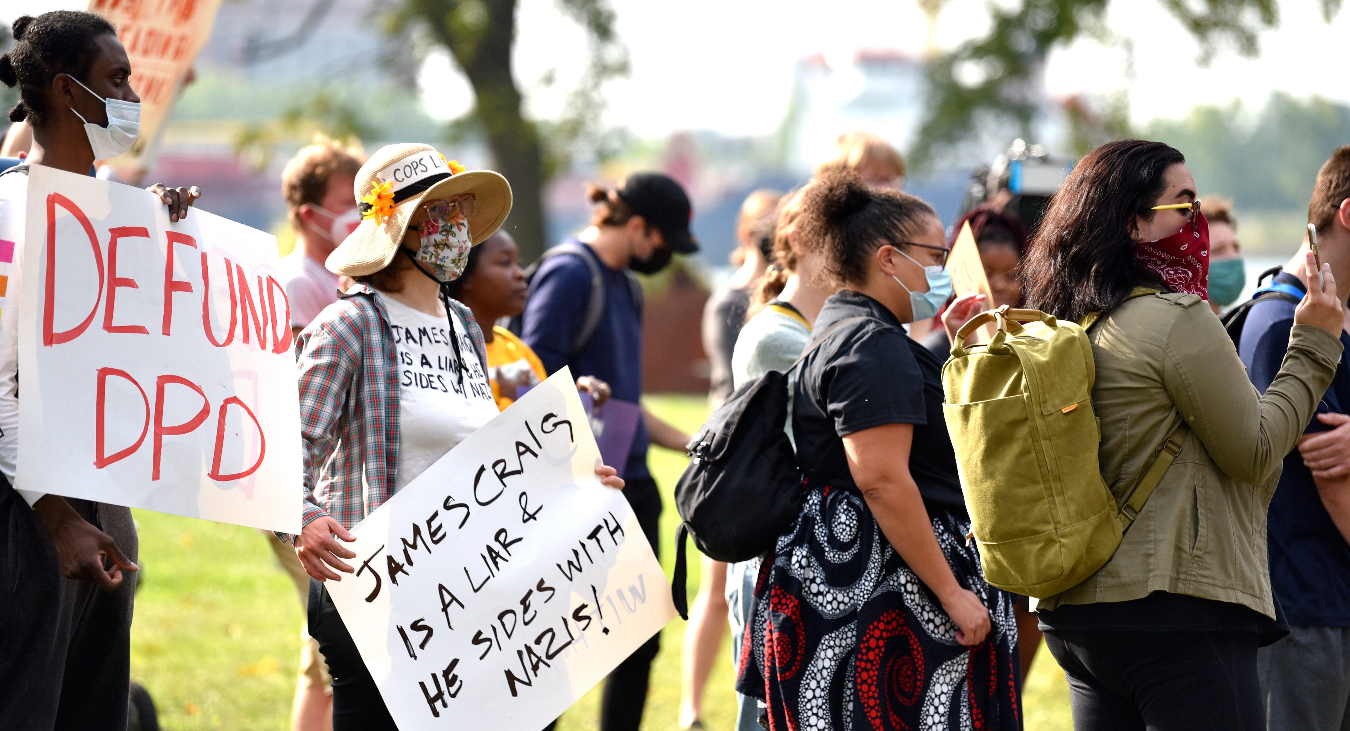 Members of Detroit Will Breathe and others protest before the arrival of former DPD Chief James Craig, Tuesday morning, September 14, 2021.