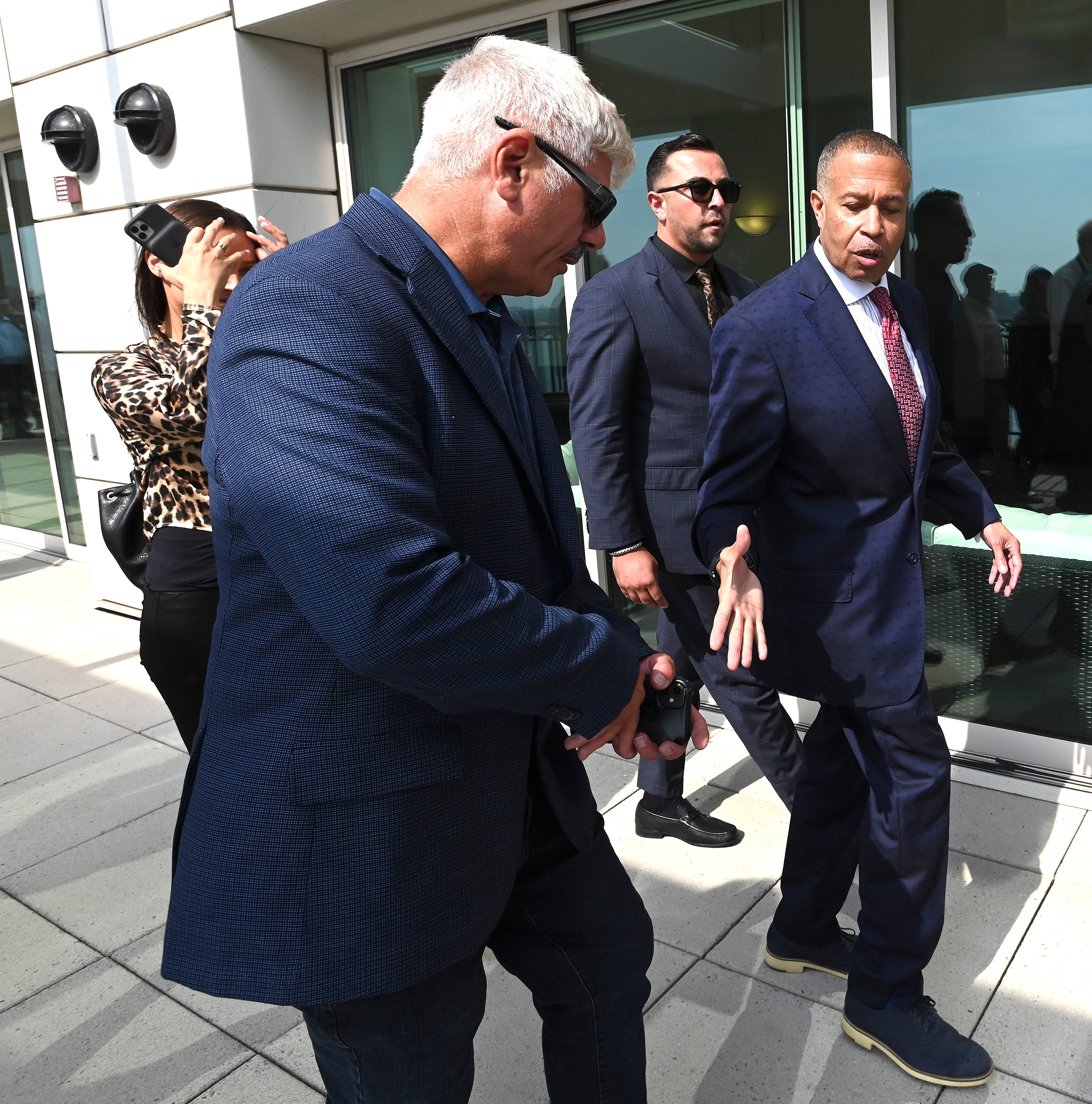 Former Detroit Police Chief James Craig, right, shakes hands with supporters after announcing his Republican candidacy for Michigan governor on the eighth floor of the Icon building, formerly the UAW-GM Center for Human Resources, in Detroit, Tuesday afternoon, September 14, 2021.