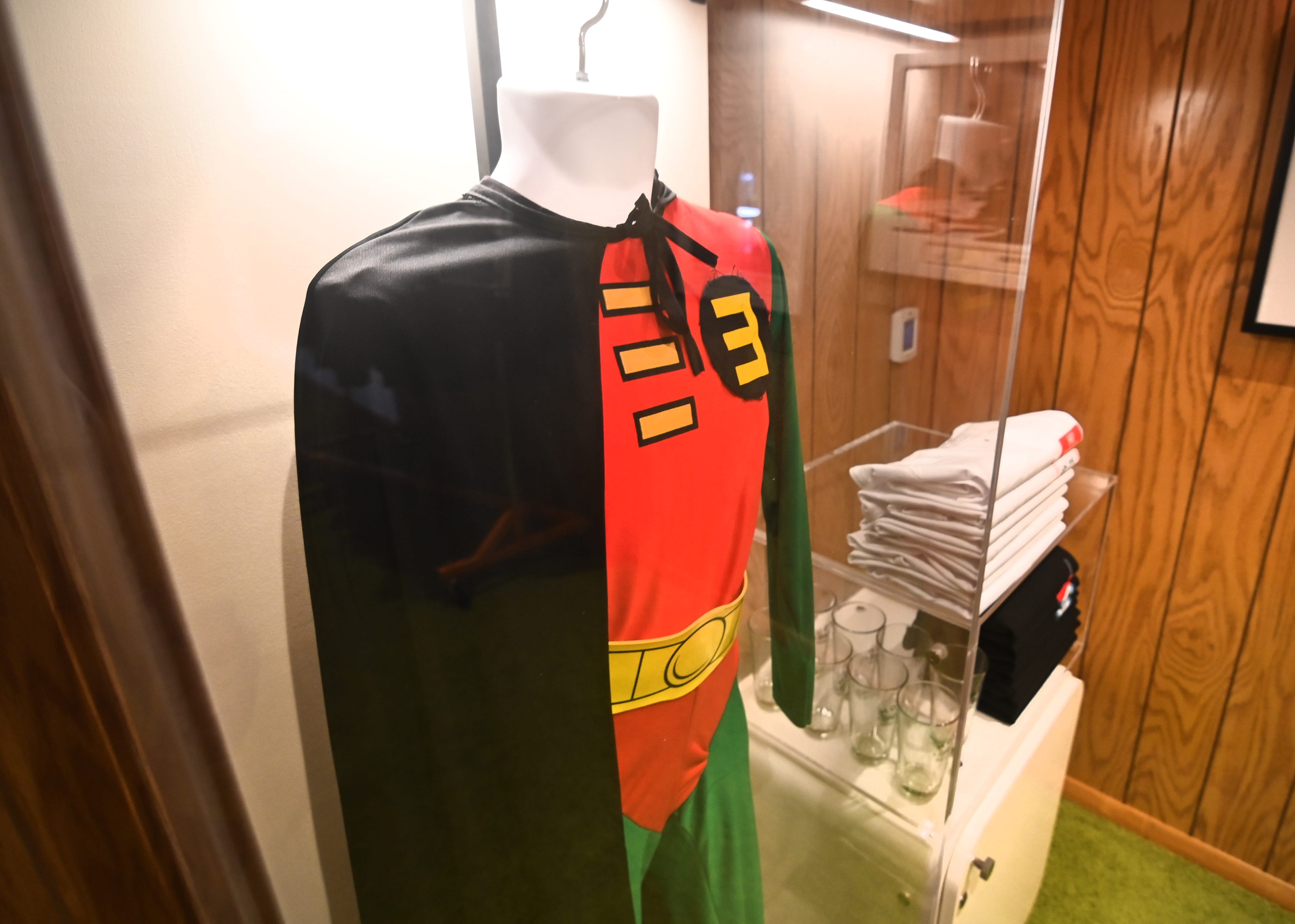 The Robin costume from Eminem's "Without Me" video is seen inside The Trailer shop at Mom’s Spaghetti.