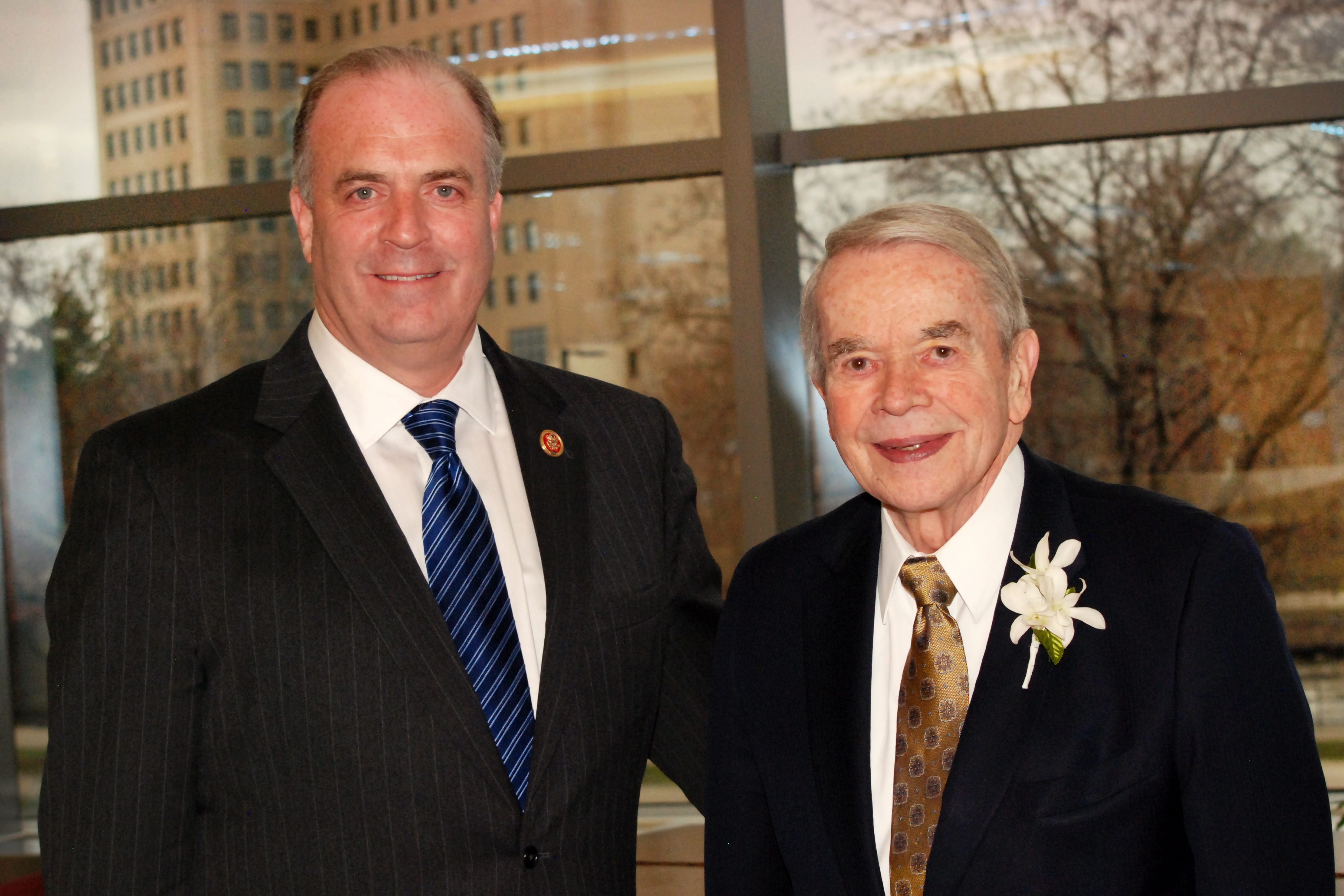 Former U.S. Rep. Dale Kildee, right, has died at age 92. He was succeeding in Congress by his nephew, U.S. Rep. Dan Kildee of Flint Township. The two are pictured in Flint in 2014.