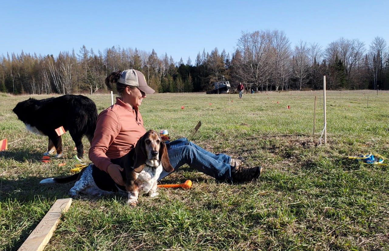 Kate Leese, joined by her husband Adam Kendall and their two dogs Frank and Baker, reviews the spreadsheet tool used to map the 43 row vineyard that the couple planned to test the suitability of wine grape varietals on Beaver Island, Michigan