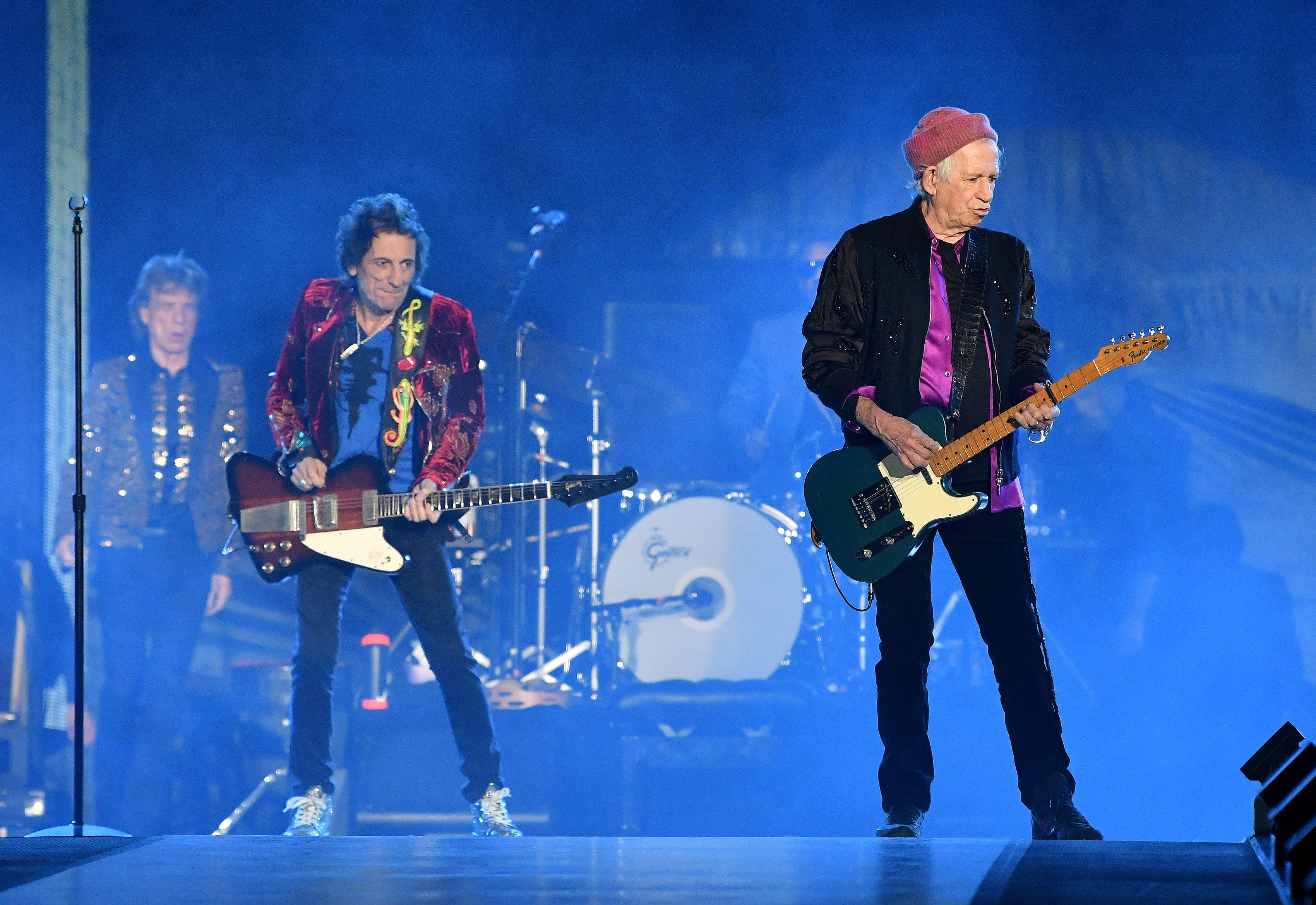 The Rolling Stones Mick Jagger, left, Ronnie Wood and Keith Richards take the stage at Ford Field.