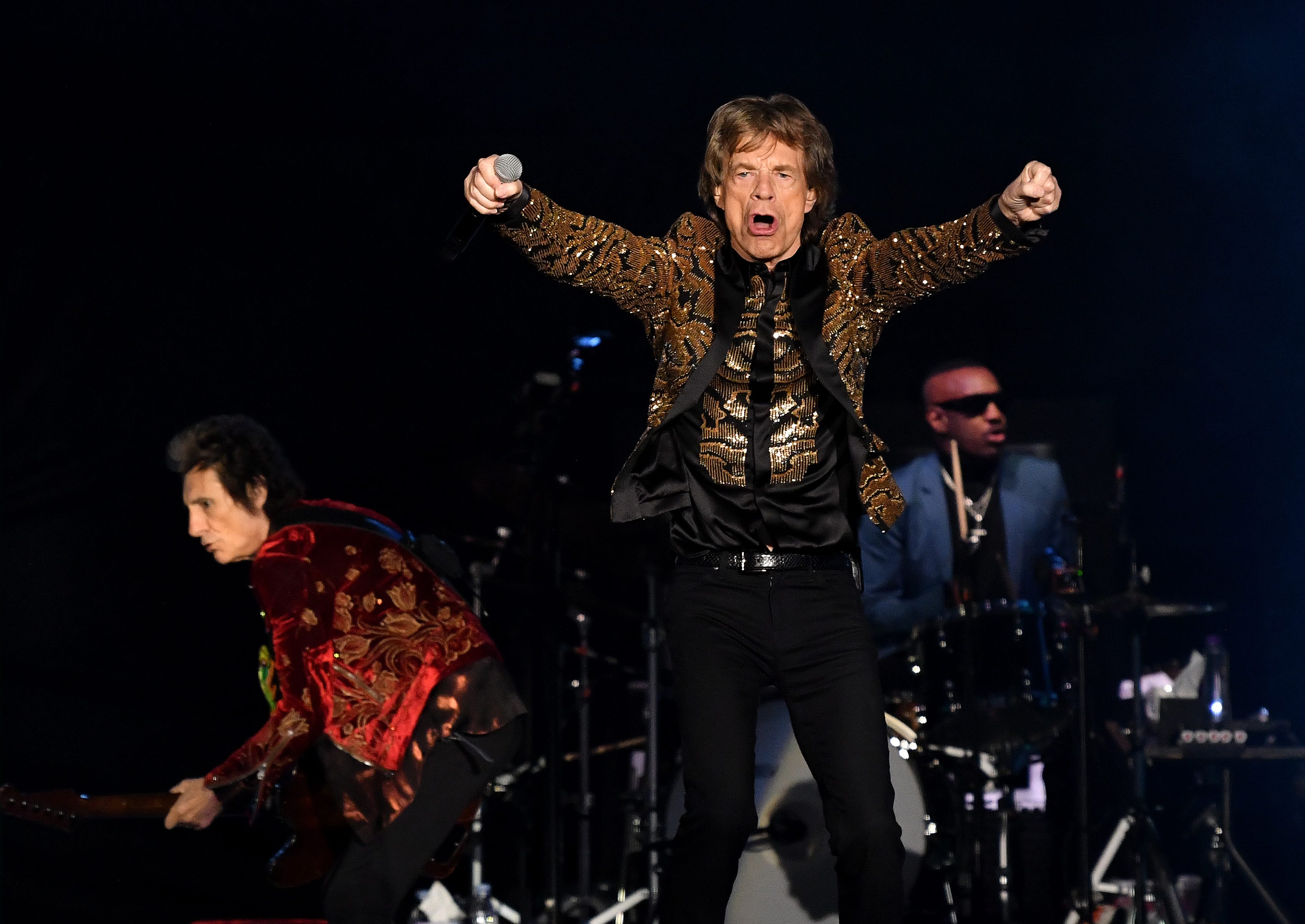 From left, Ronnie Wood, Mick Jagger and Steve Jordan play Ford Field.