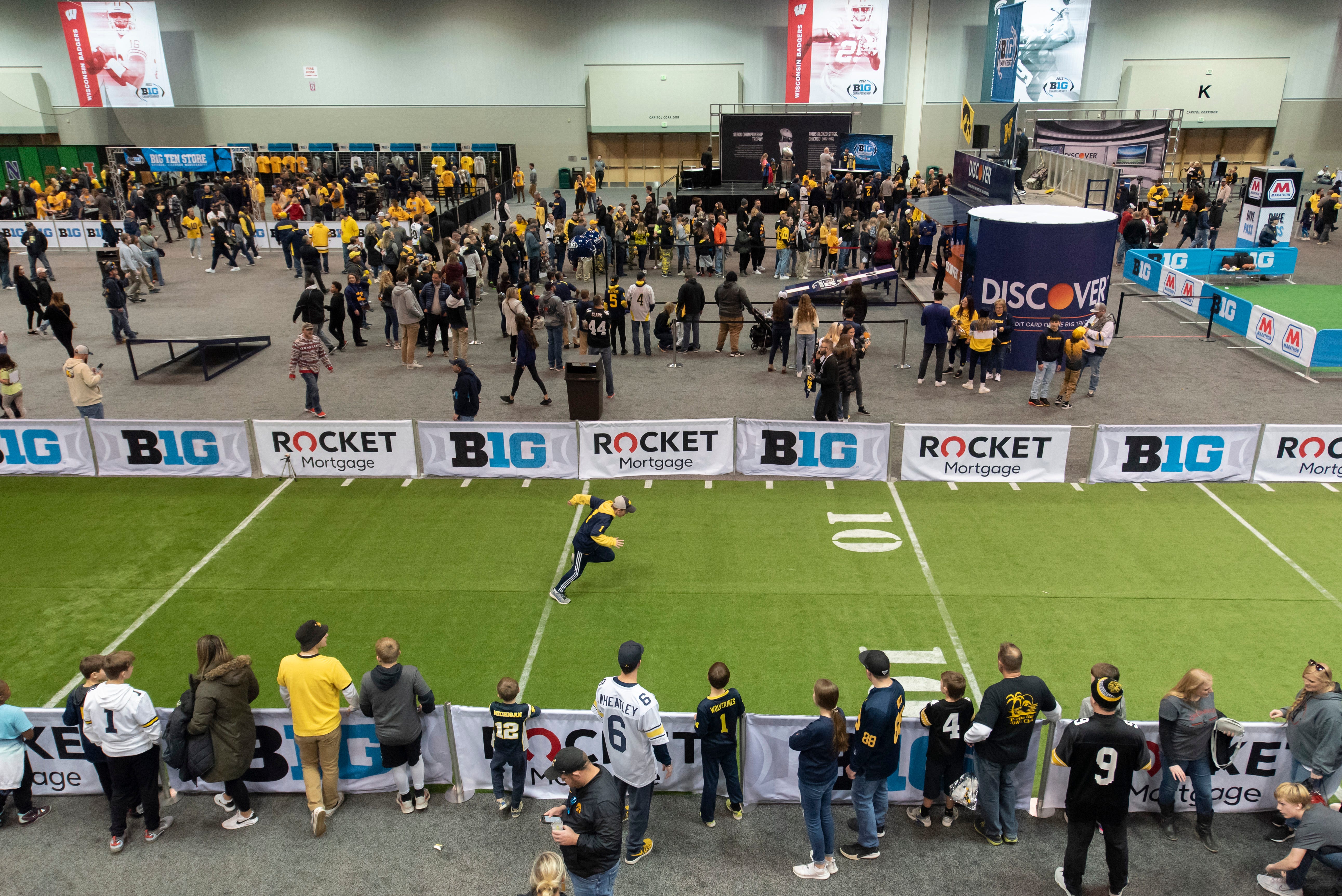 Fans enjoy the Fan Fest at the Indiana Convention Center, before the start of the Big Ten championship game.