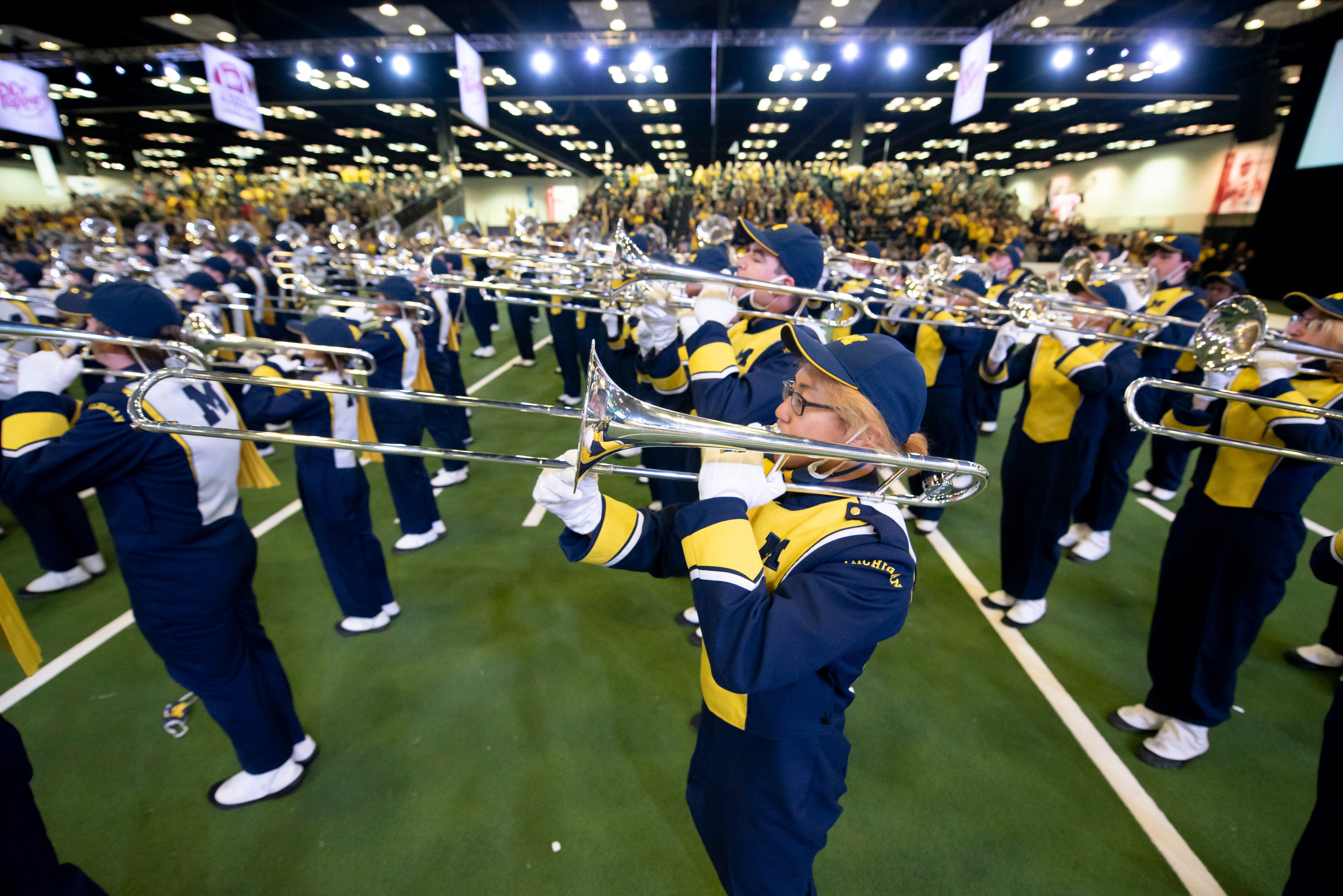 The Michigan Marching Band performs at the Fan Fest at the Indiana Convention Center, before the start of the Big Ten championship game.