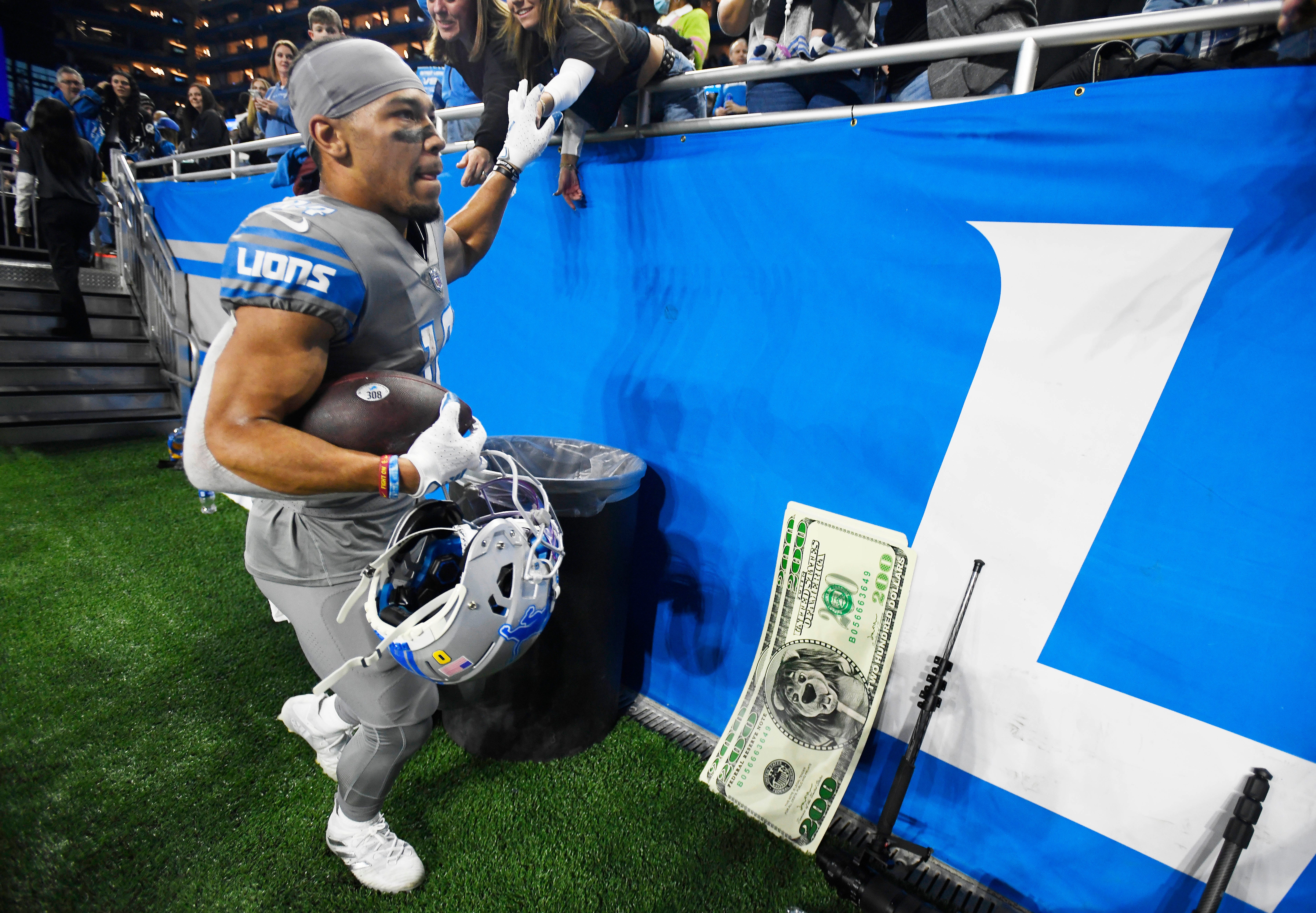 Lions' Amon-Ra St. Brown leaves the field after making the big money play, a reception in the end zone for the game winning touchdown, with no time left on the clock, over the Vikings, 29-27.