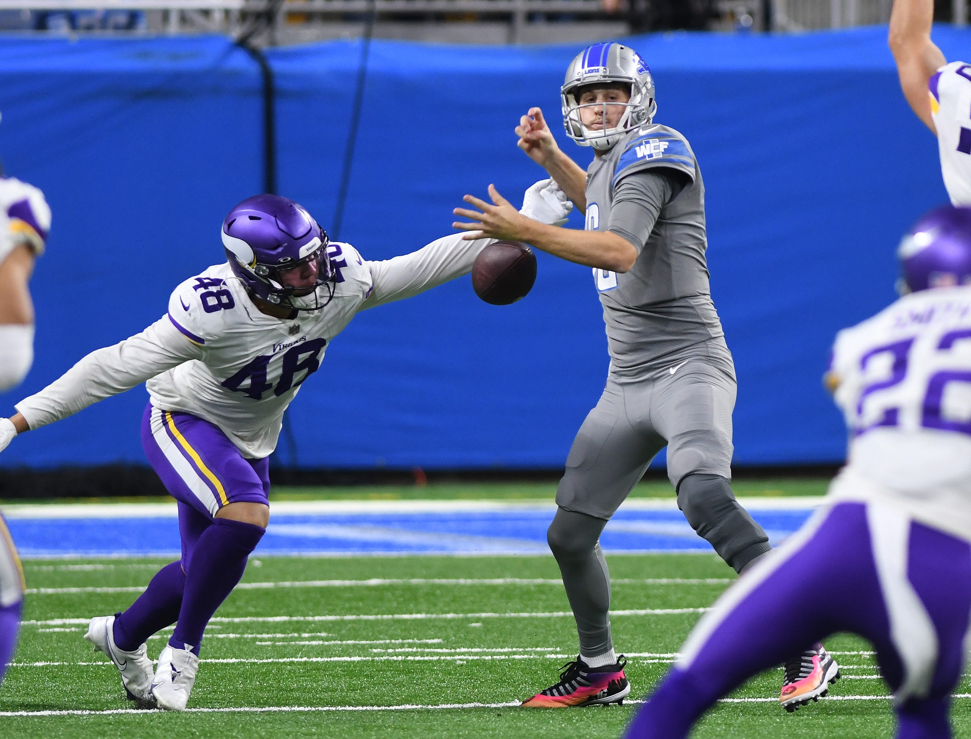 Vikings' Blake Lynch causes the fumble, which the Vikings recover, by Lions quarterback Jared Goff in the fourth quarter.