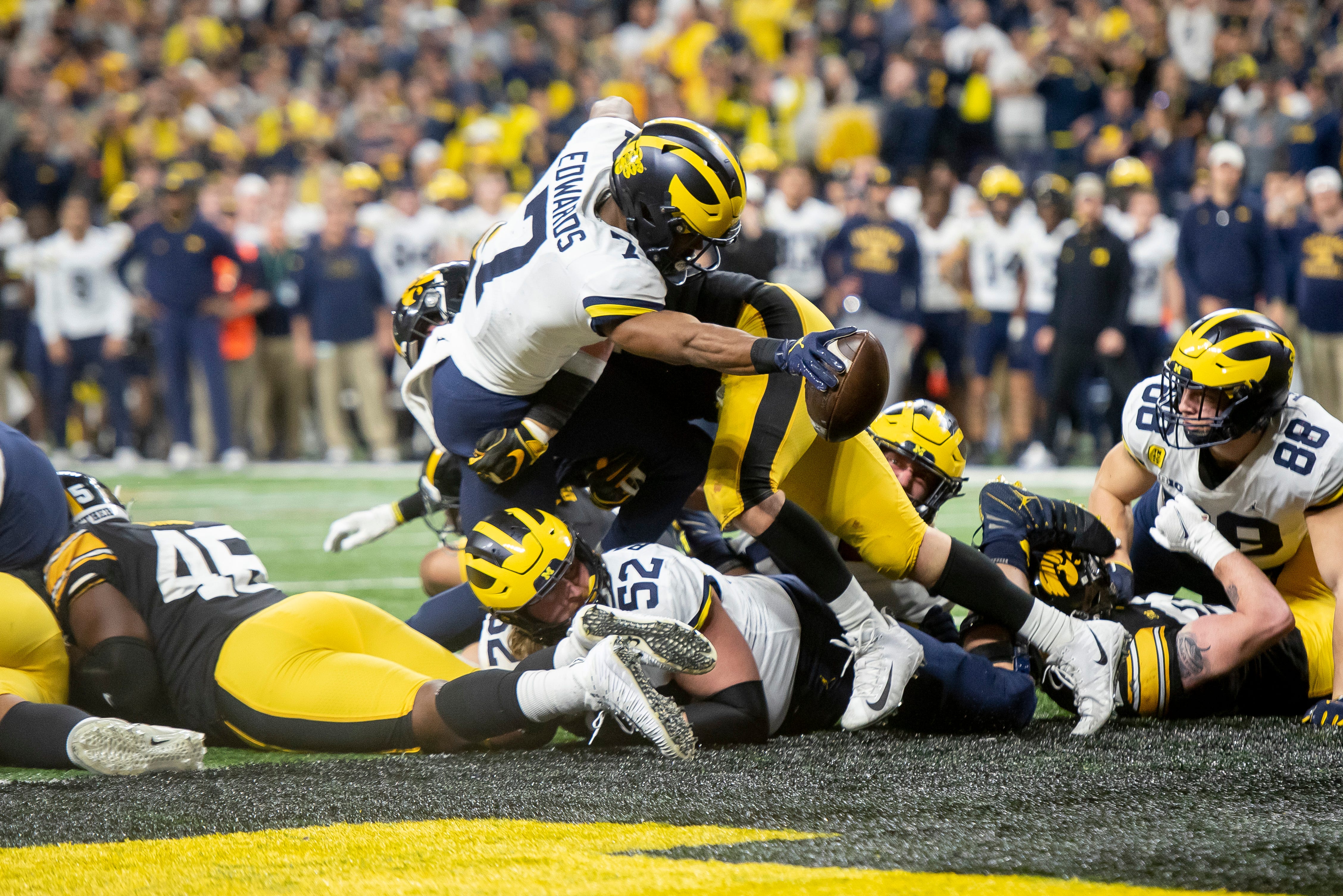 Michigan running back Donovan Edwards reaches across the goal line for a touchdown during the fourth quarter.