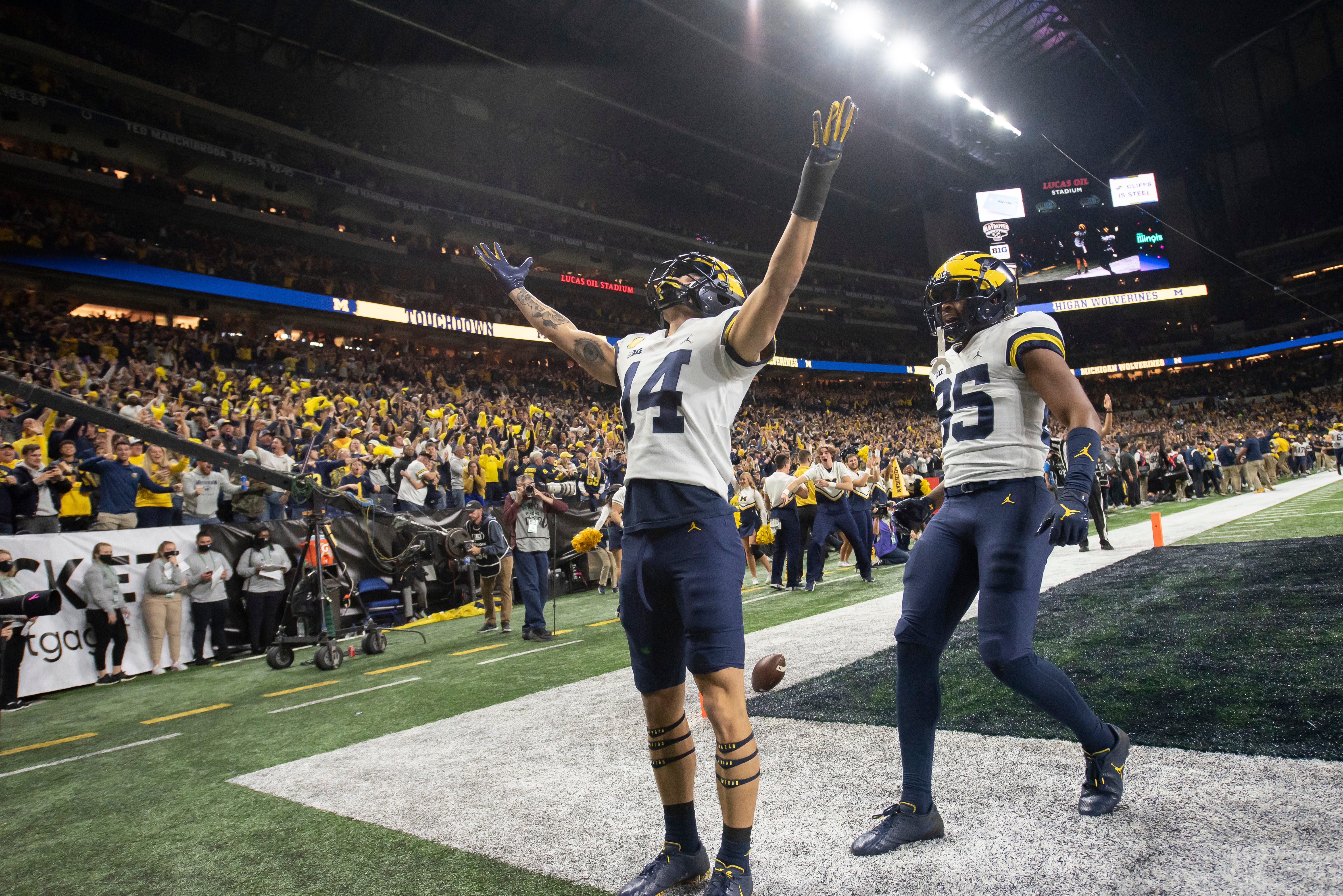 Michigan wide receiver Roman Wilson celebrates after scoring a touchdown during the first quarter.