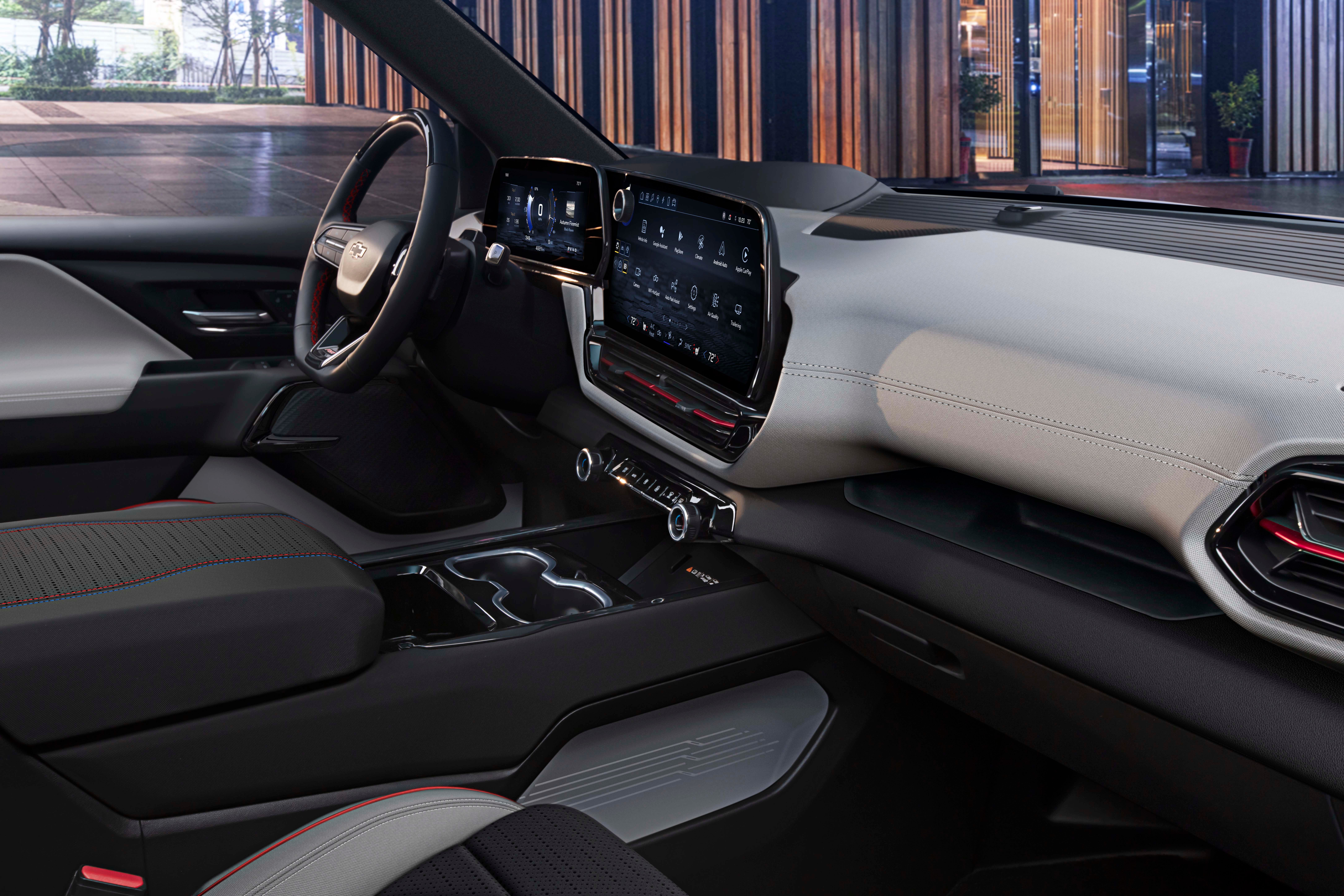 The posh interior of the $105k 2024 Chevrolet Silverado EV RST pickup features big screens and class-leading cargo space.