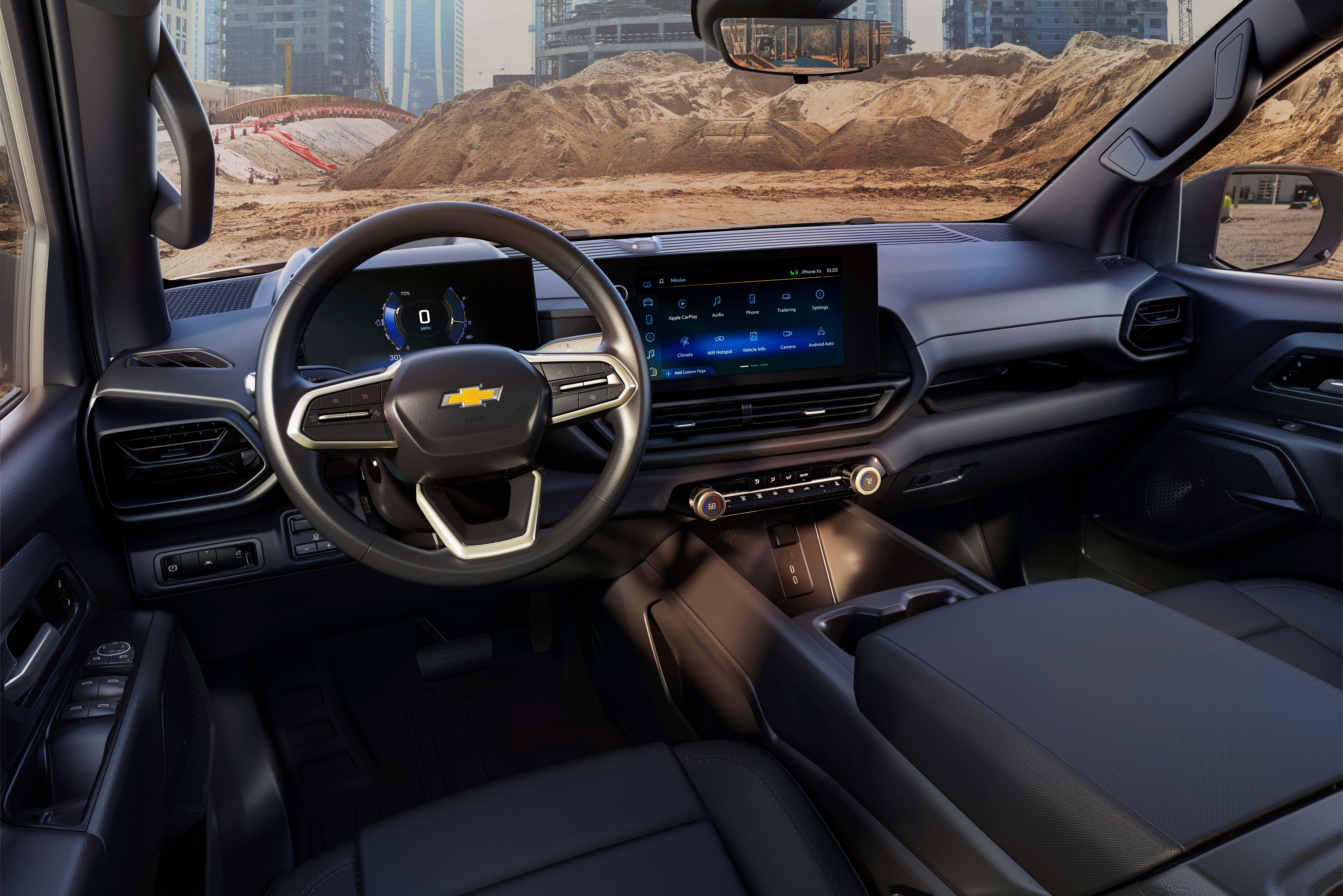 The Chevrolet Silverado EV Work Truck interior features smaller, dual digital screens than the 2024 Chevrolet Silverado EV RST for retail customers.