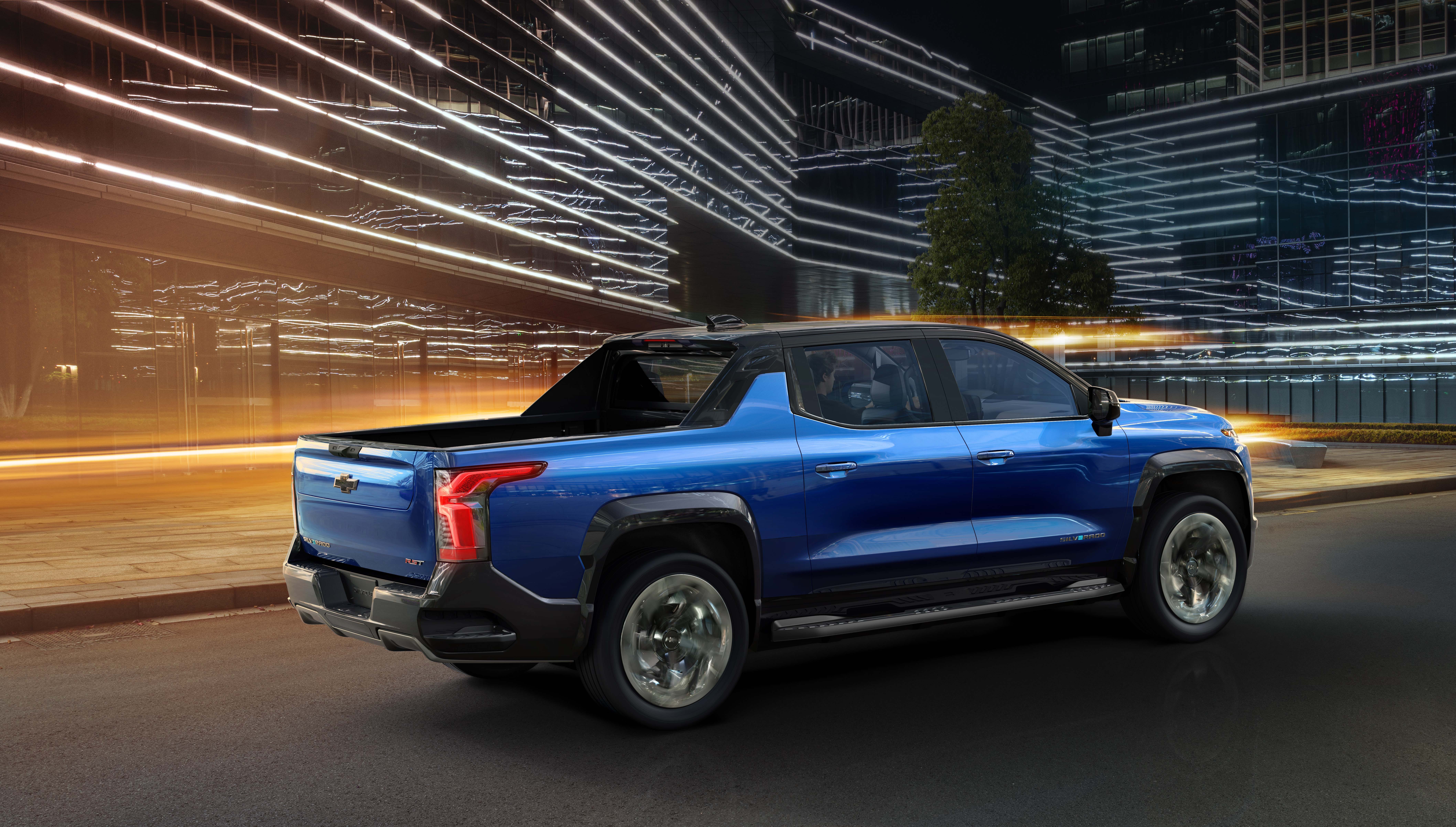 The 2024 Chevrolet Silverado EV RST rolls on huge, 24-inch wheels, all-wheel-drive, and 145.6-inch wheelbase.