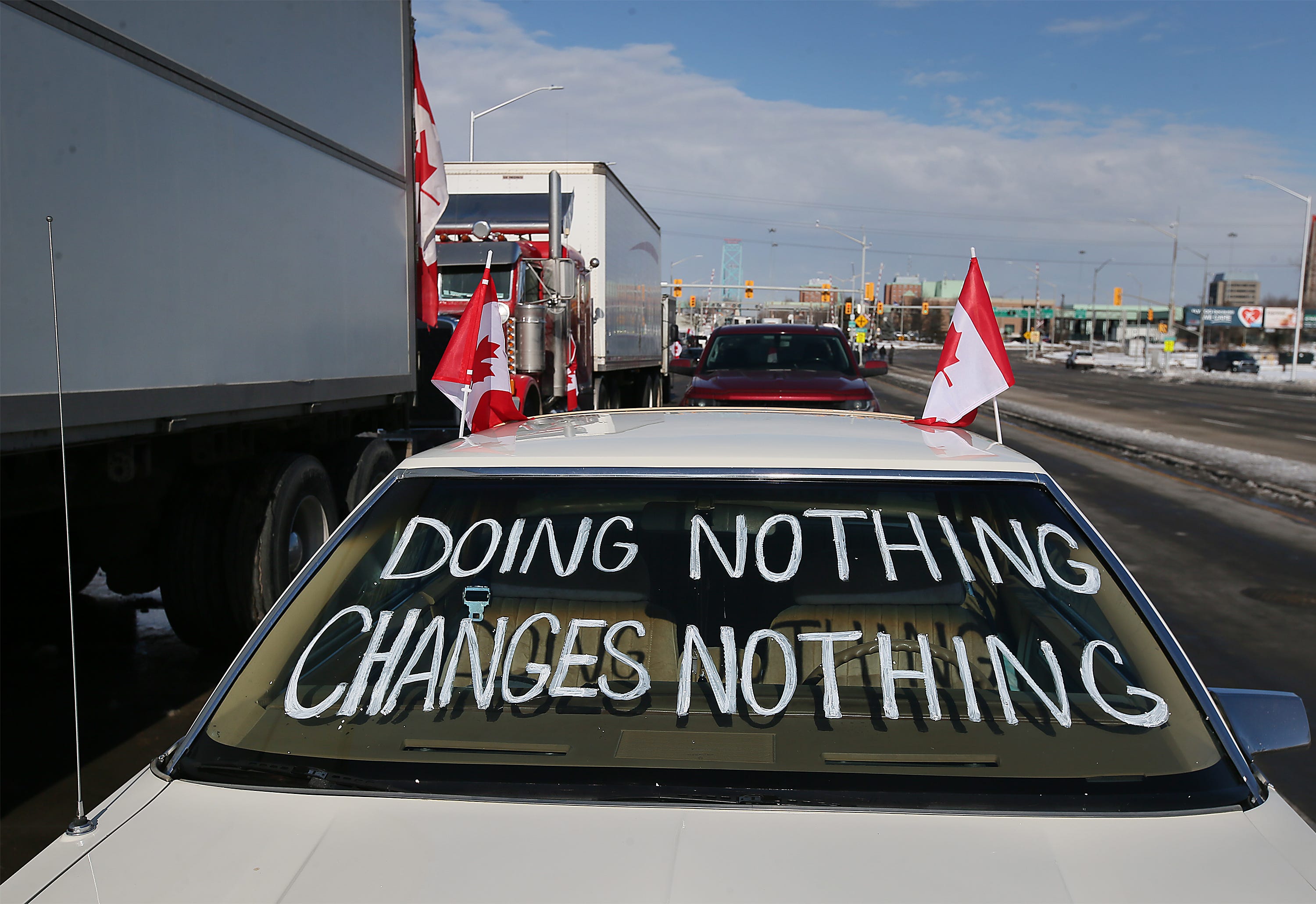 A vehicle parked among the protestors near the Ambassador Bridge in Windsor is shown on Wednesday, February 9, 2022.